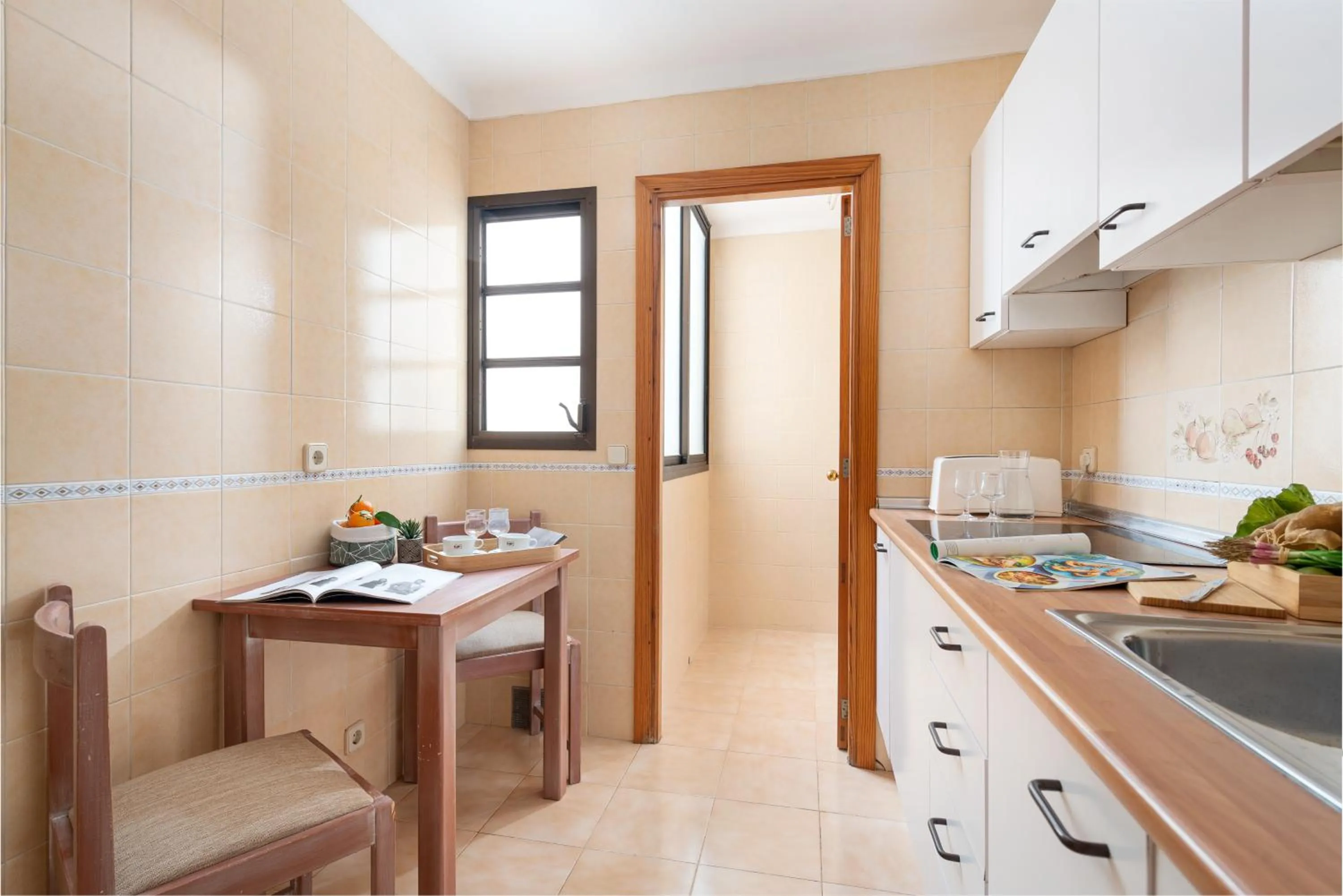 Kitchen or kitchenette in Apartamentos Carlos V