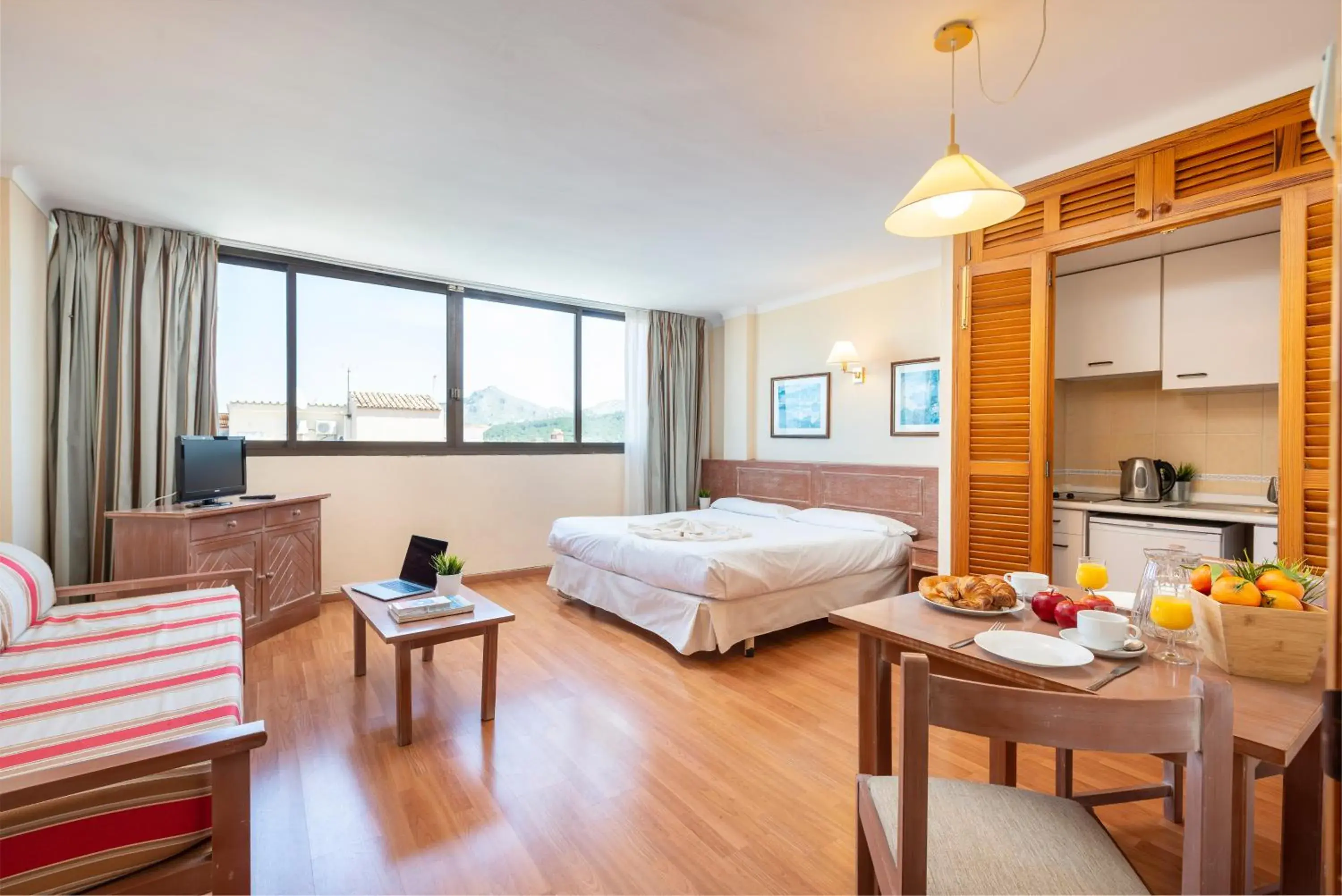 Photo of the whole room, Bed in Apartamentos Carlos V Photo of the whole room, Bed in Apartamentos Carlos V