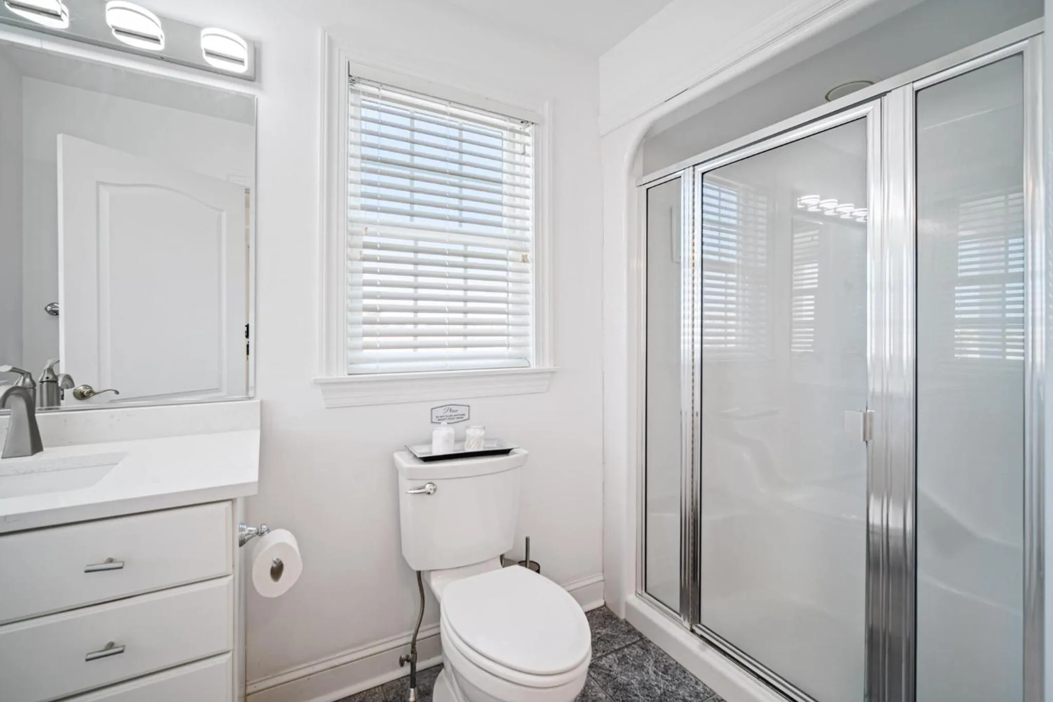 Bathroom in Exquisitely Large Home Block and a half to Beach