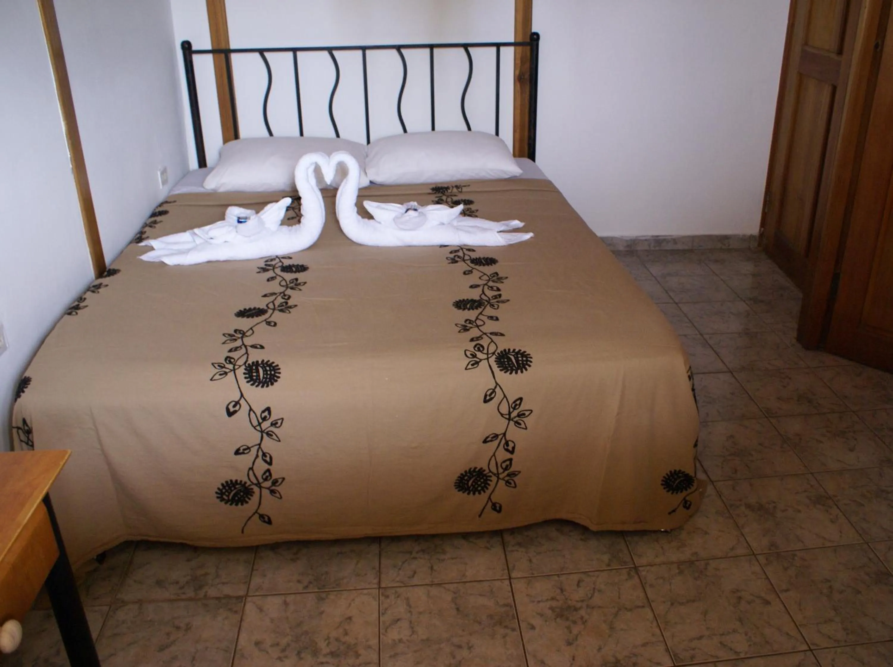 Bed in Hotel Posada Los Delfines