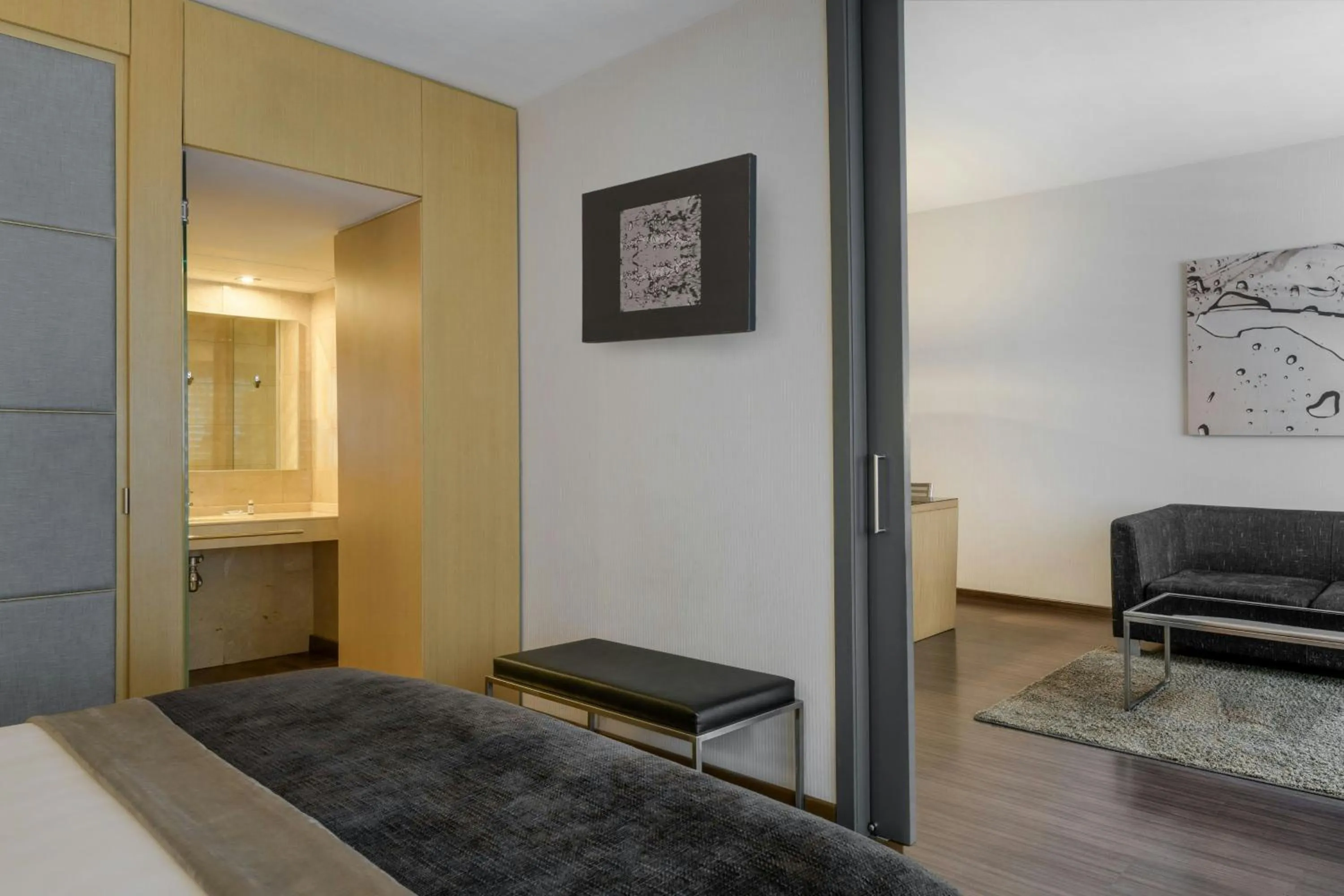 Living room in AC Hotel Victoria Suites by Marriott