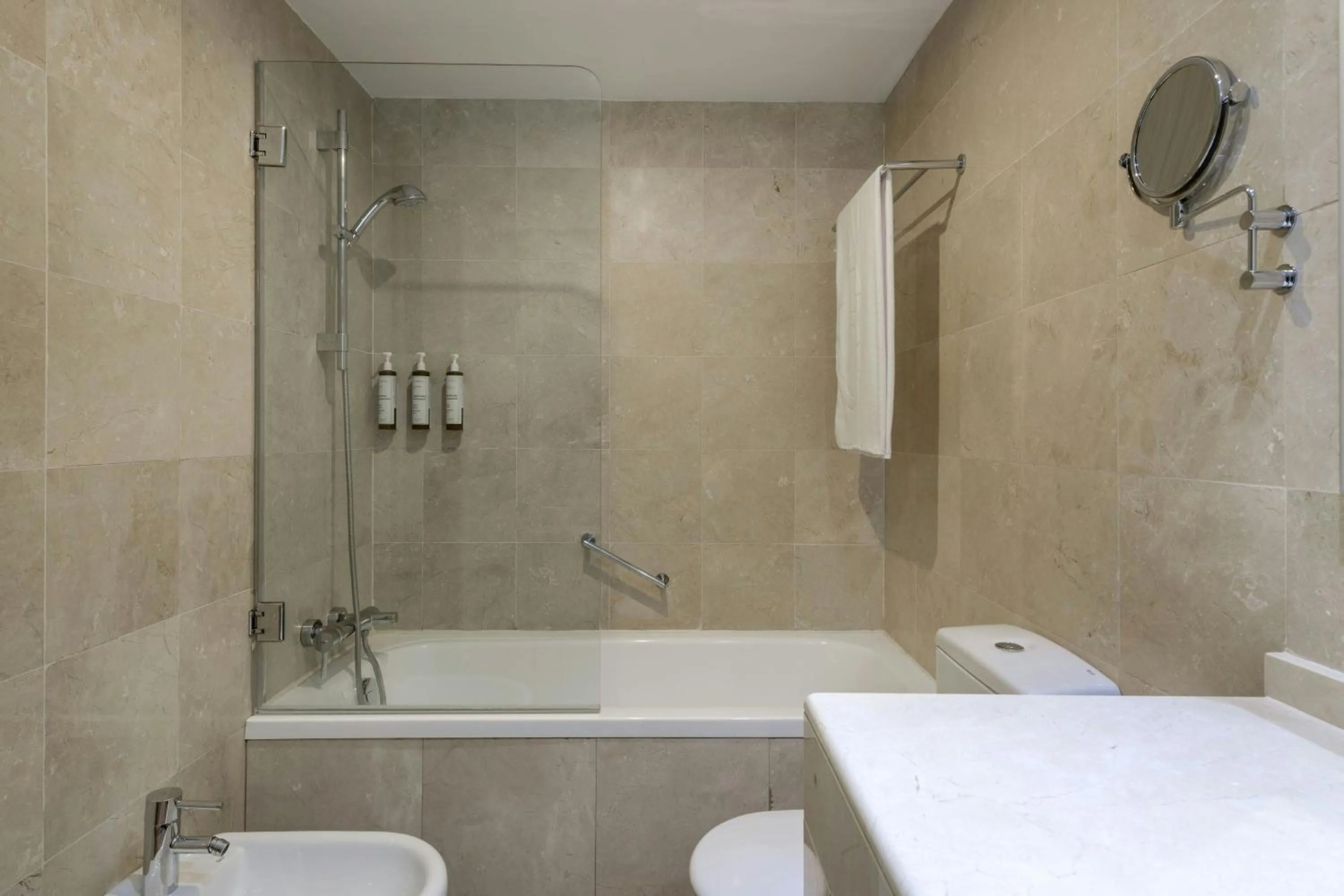 Bathroom in AC Hotel Victoria Suites by Marriott