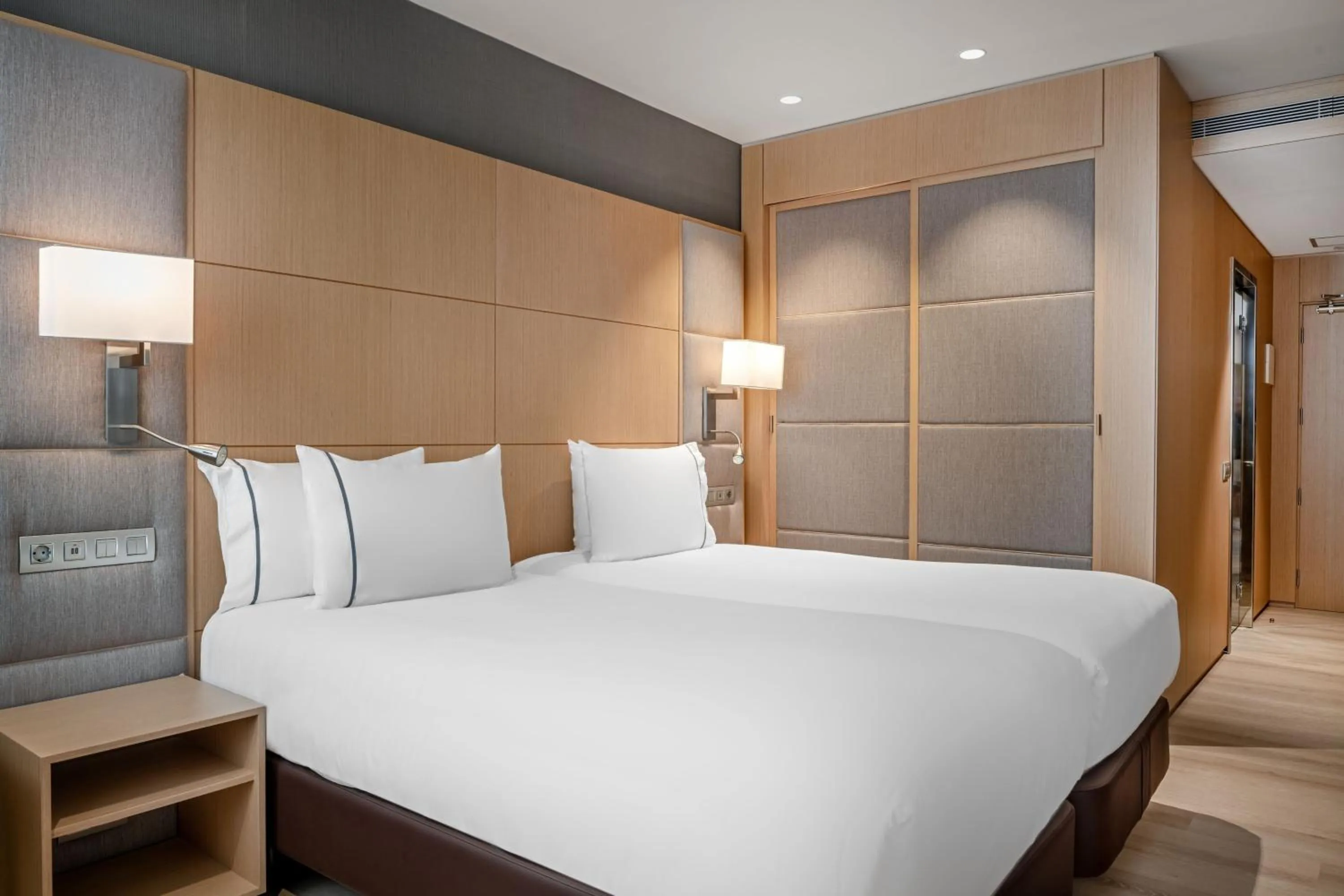 Standard Twin Room with Street View in AC Hotel Victoria Suites by Marriott