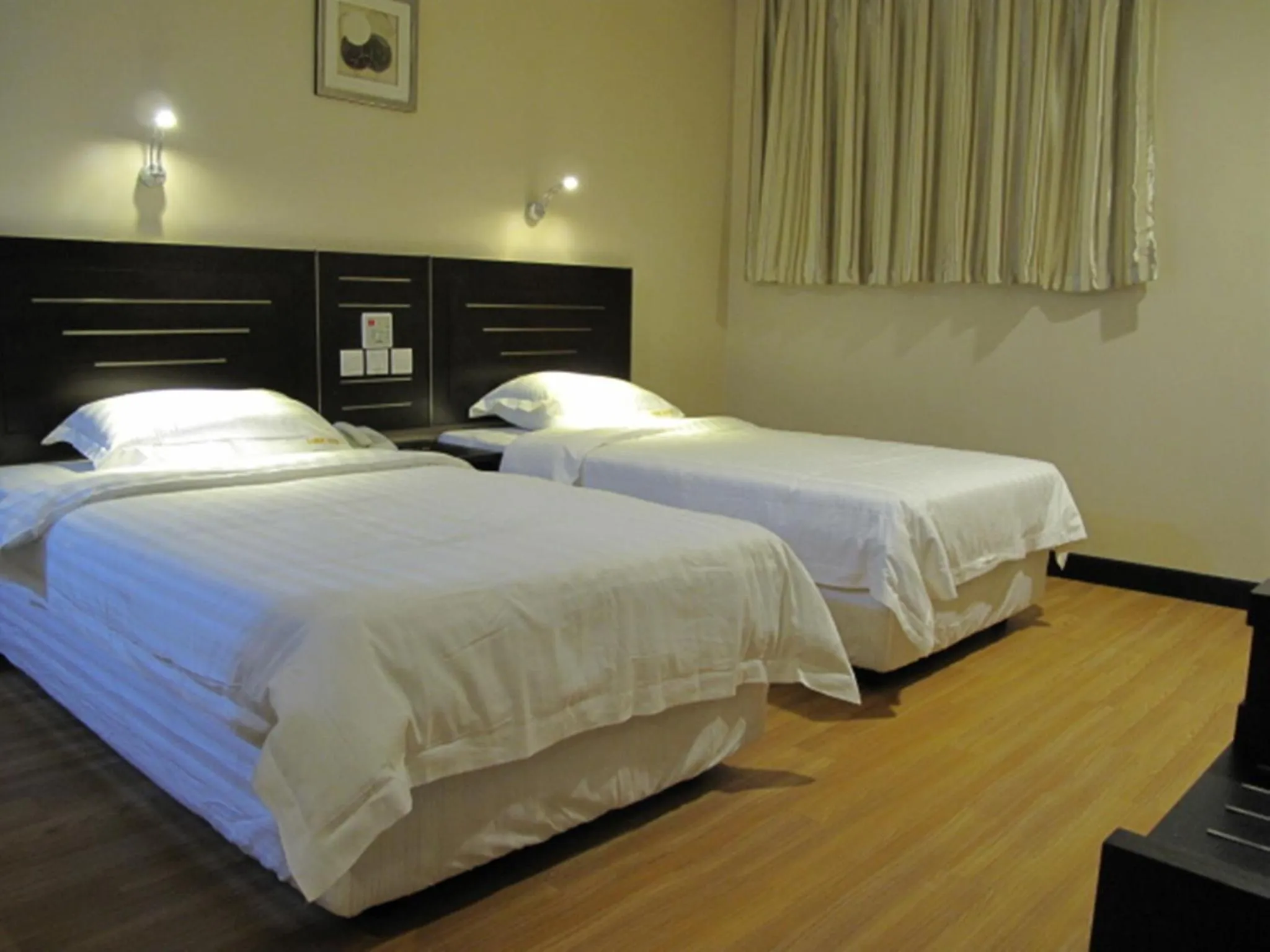 Bed in Labuk Hotel