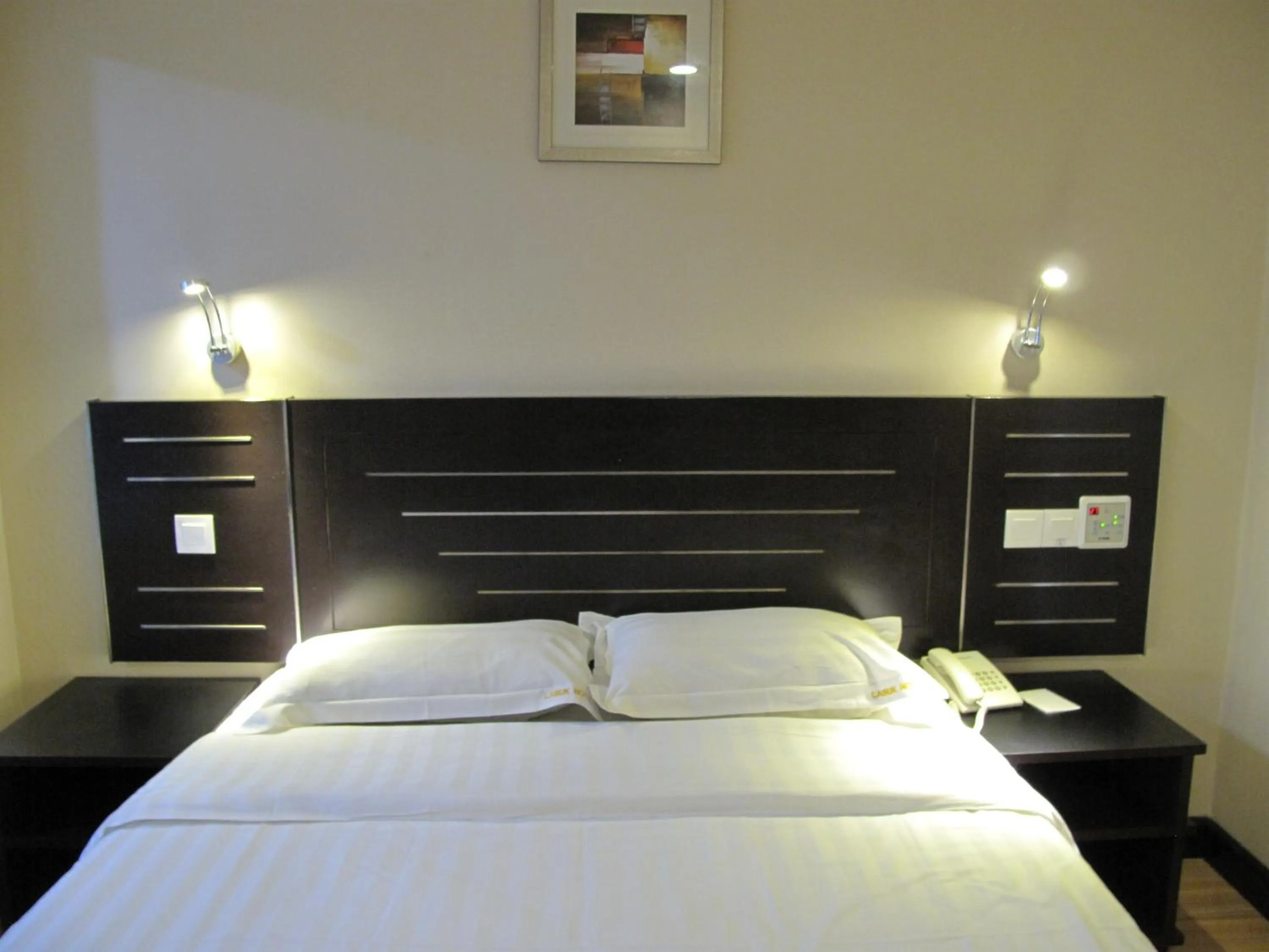 Bed in Labuk Hotel