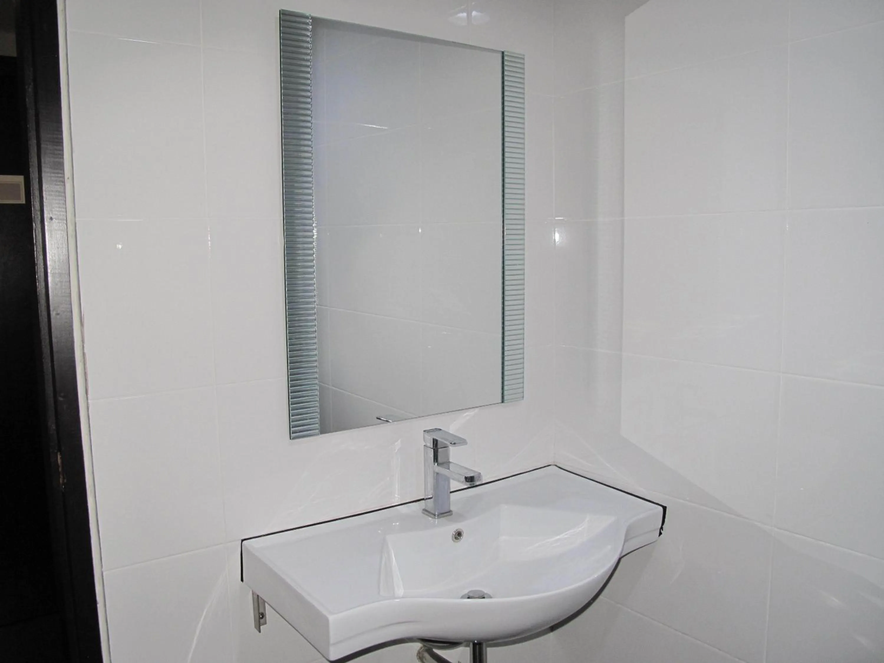 Bathroom in Labuk Hotel