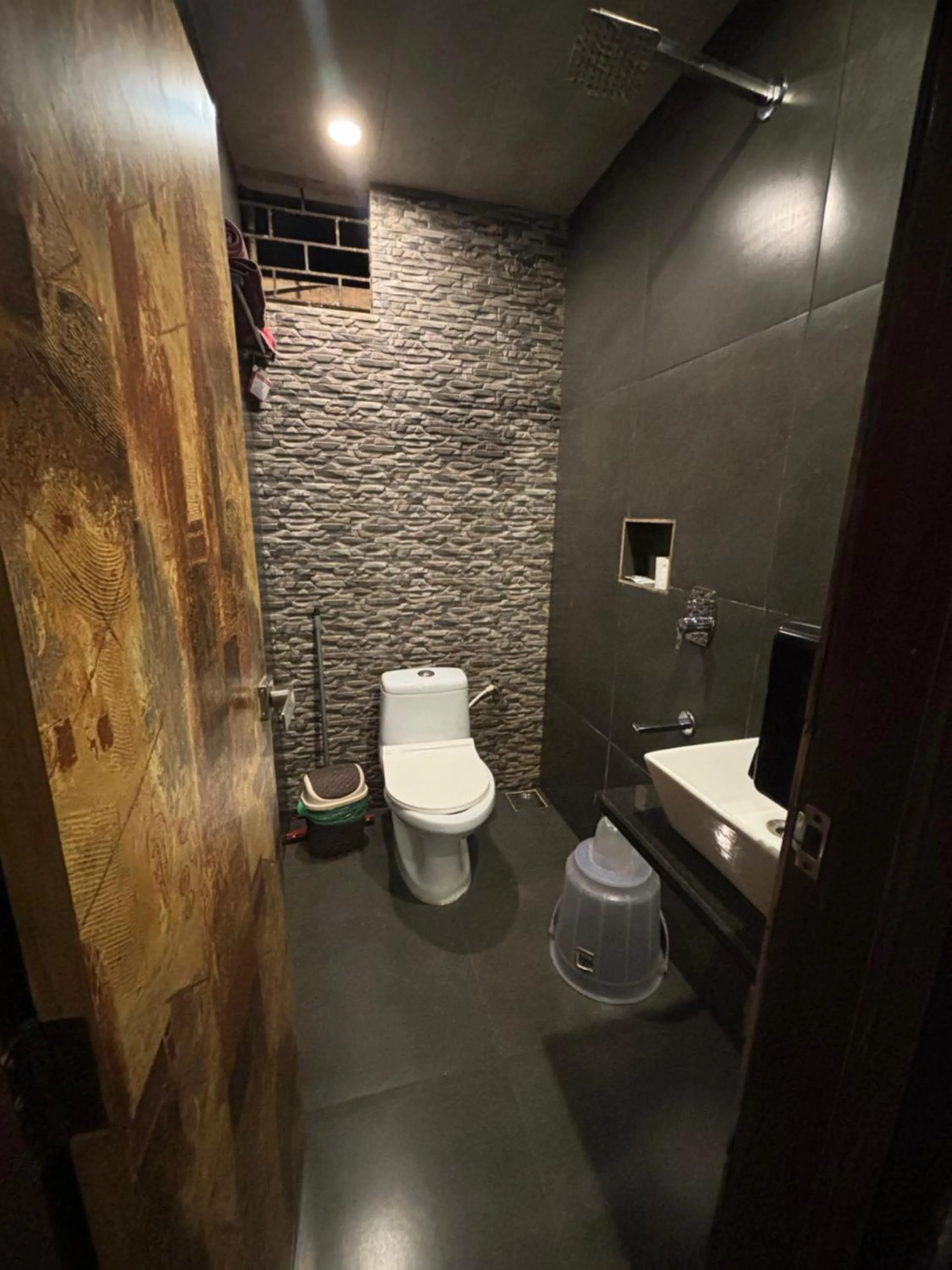 Bathroom in Aariv Inn BAGA BEACH