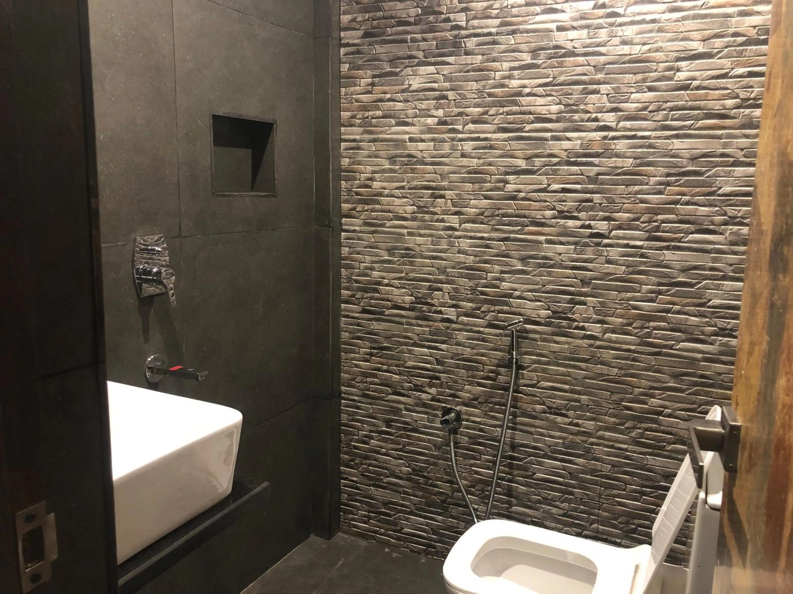 Shower in Aariv Inn BAGA BEACH