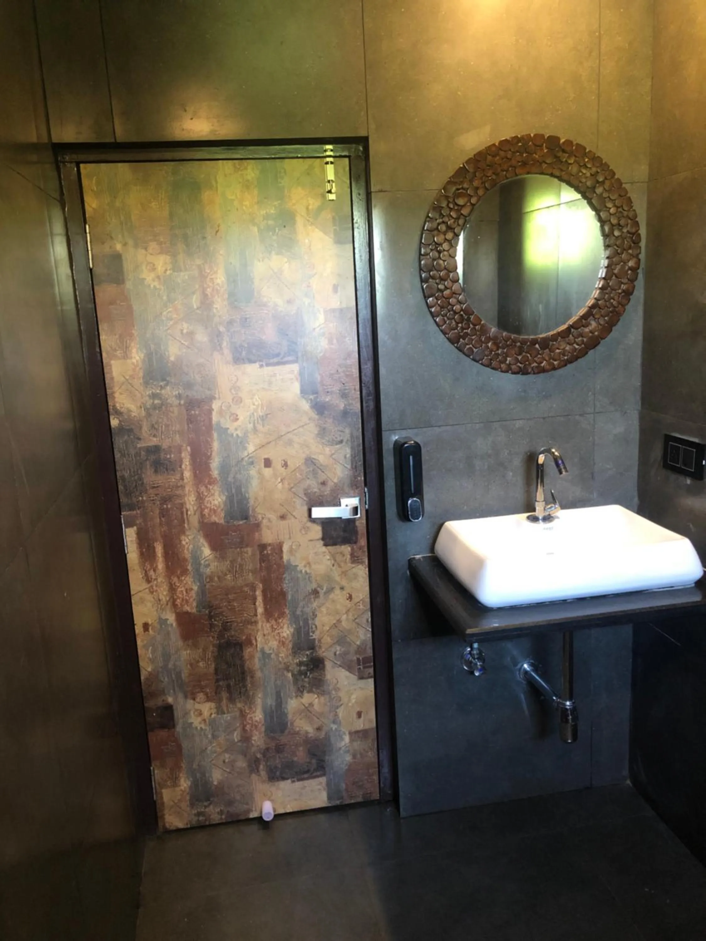 Bathroom in Aariv Inn BAGA BEACH