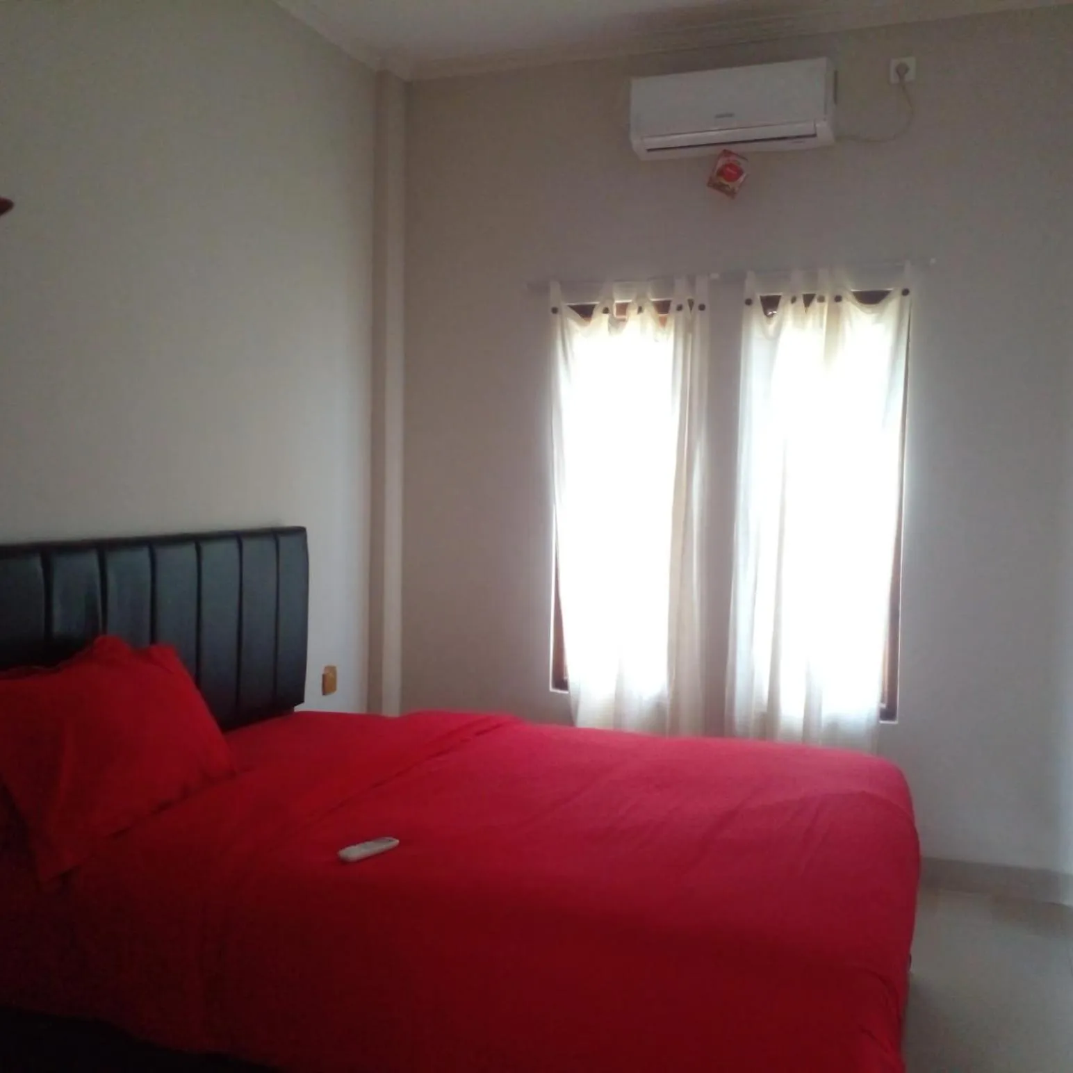 Bed in Lembunai Home Stay