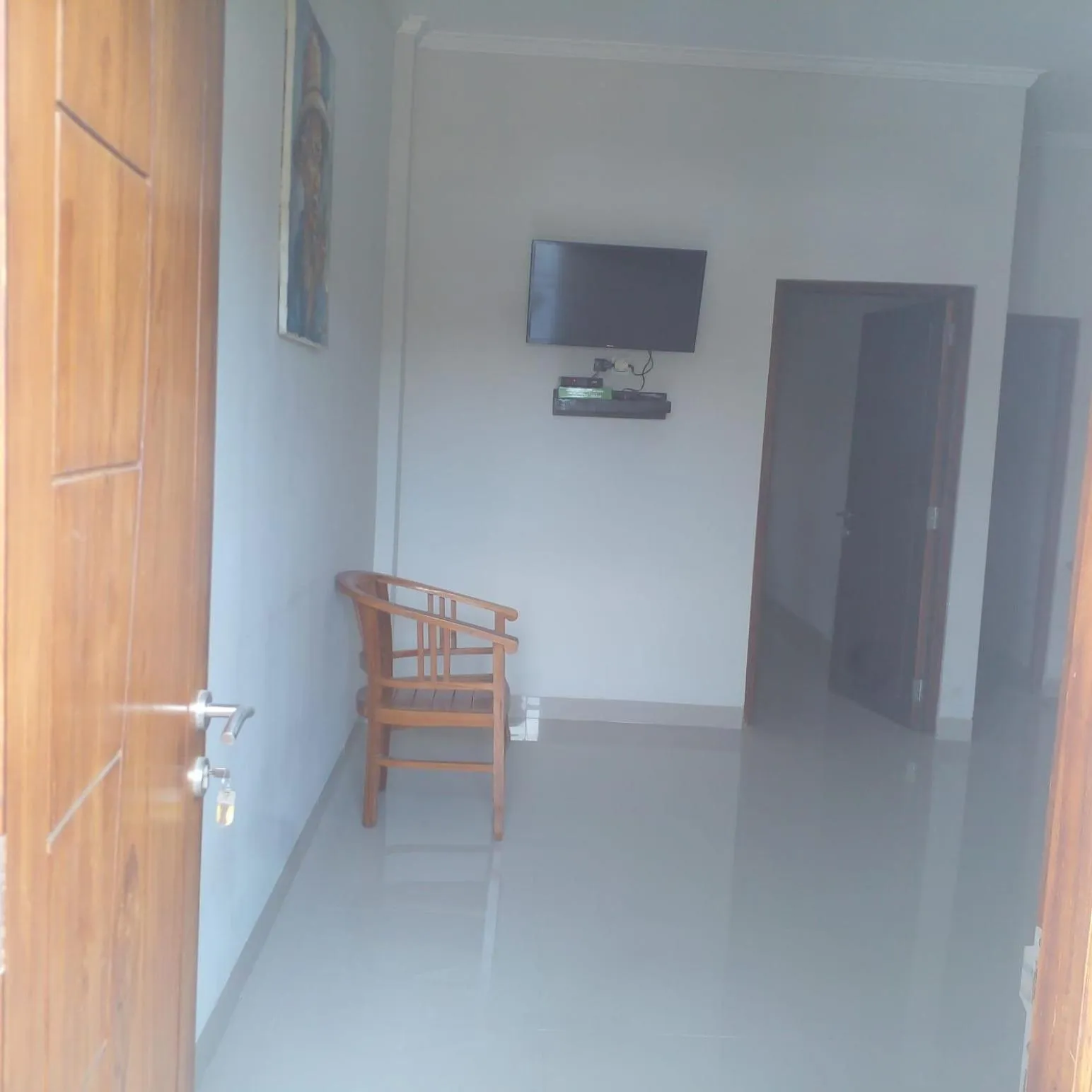 TV and multimedia in Lembunai Home Stay