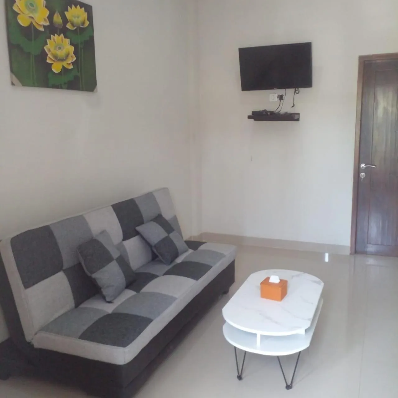 Living room in Lembunai Home Stay