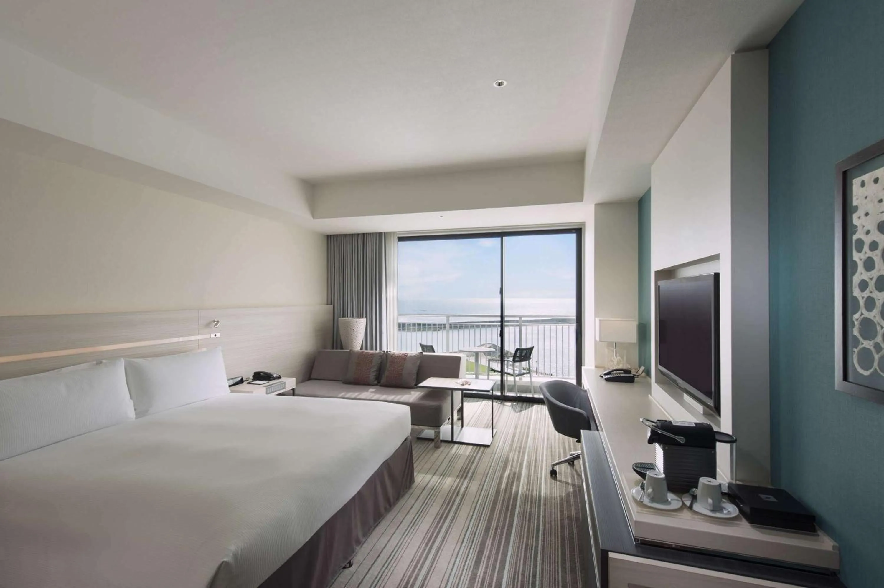 Living room, Bed in Hilton Okinawa Chatan Resort