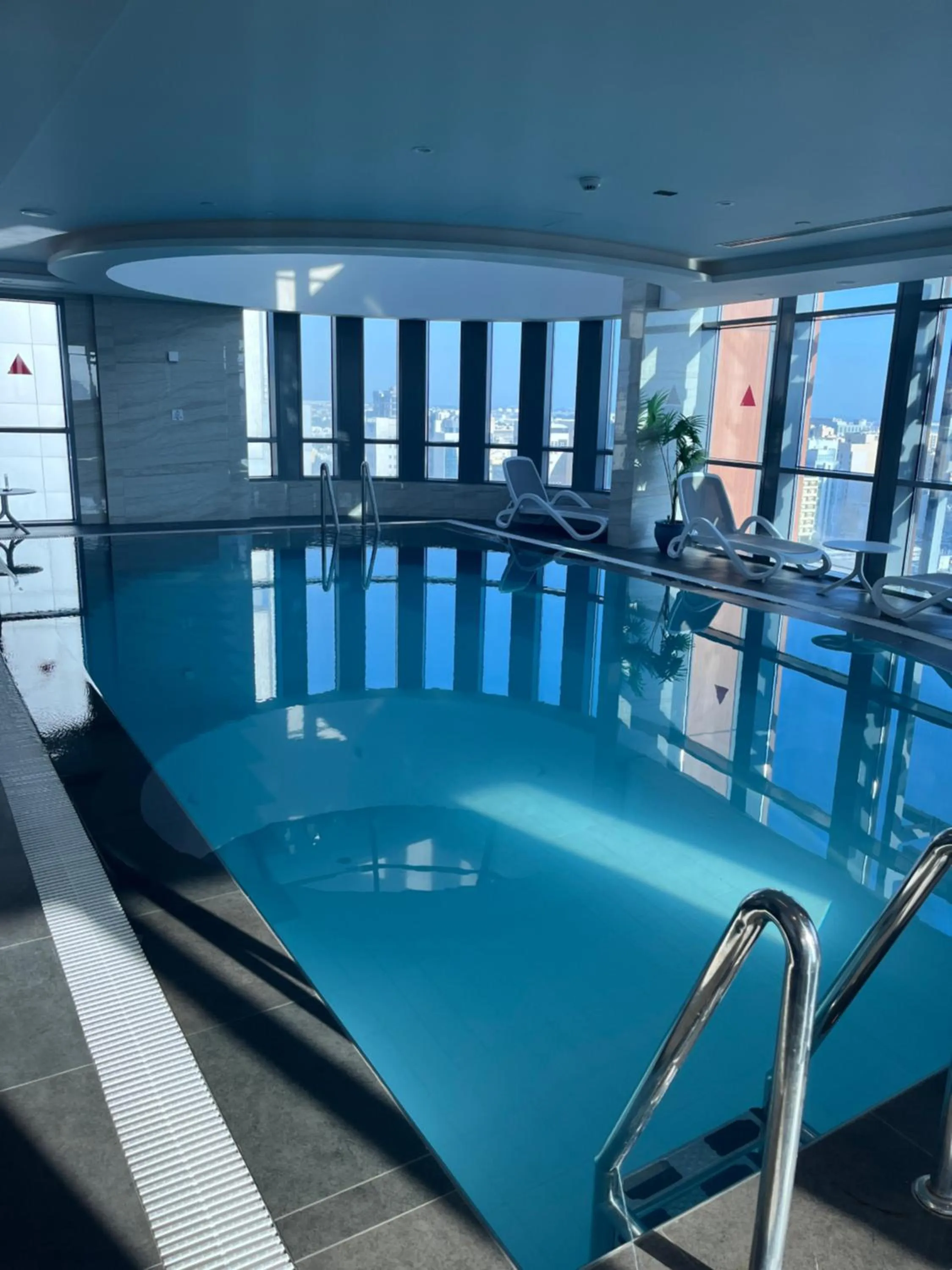 Swimming pool in C - Hotel and Suites Doha