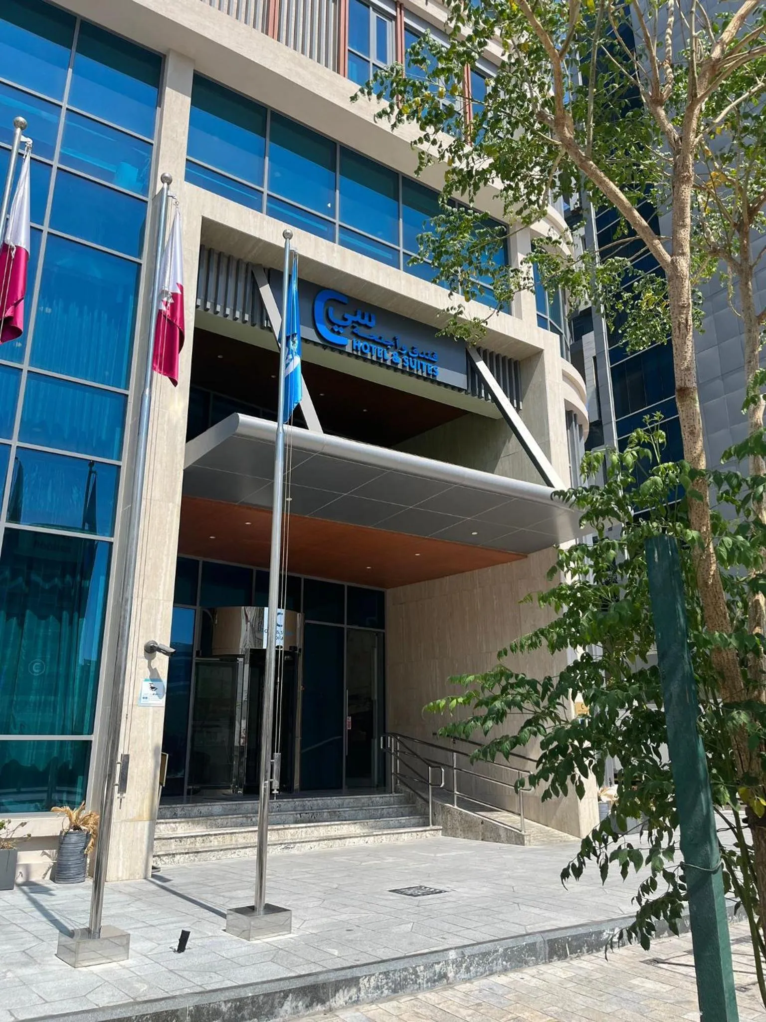Property building in C - Hotel and Suites Doha