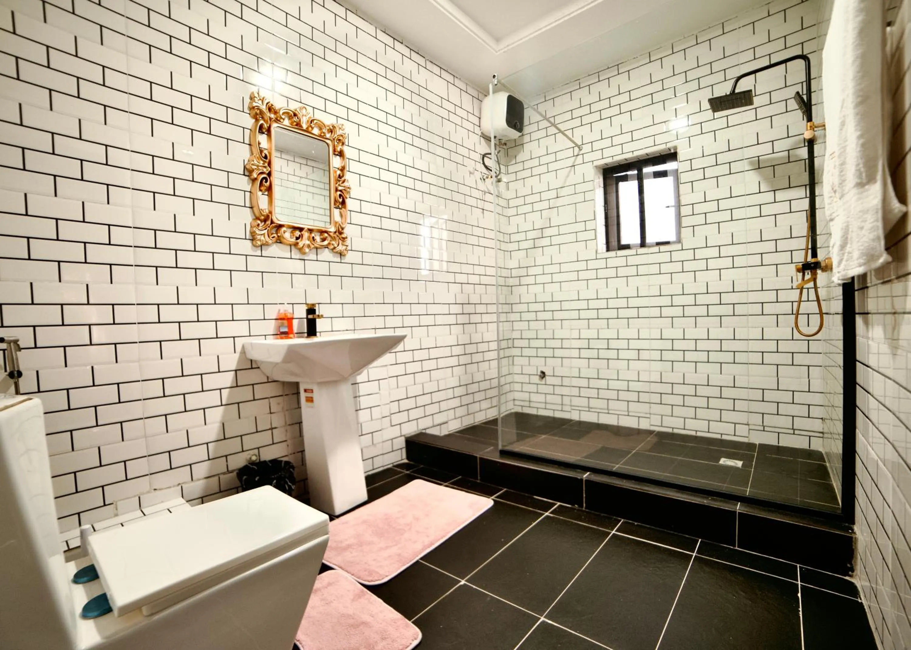 Shower in 247 Luxury Hotel & Apartment Ajah