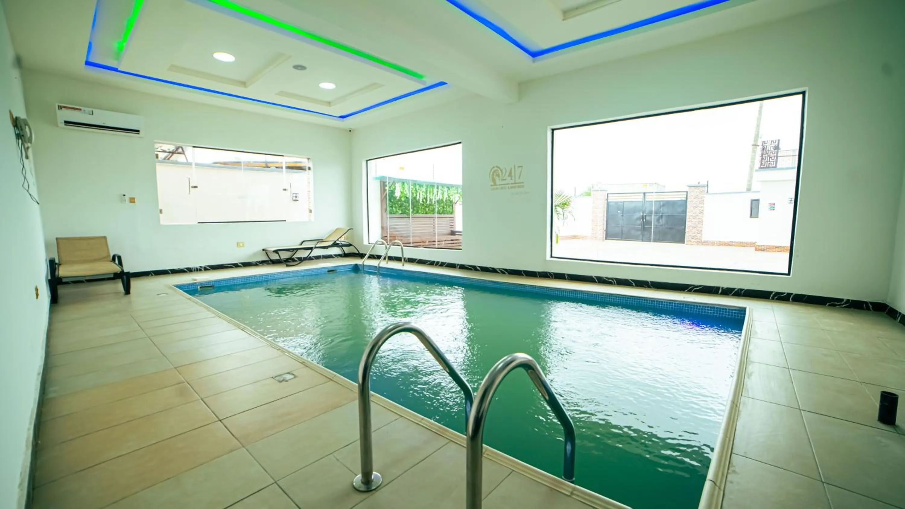 Swimming pool in 247 Luxury Hotel & Apartment Ajah