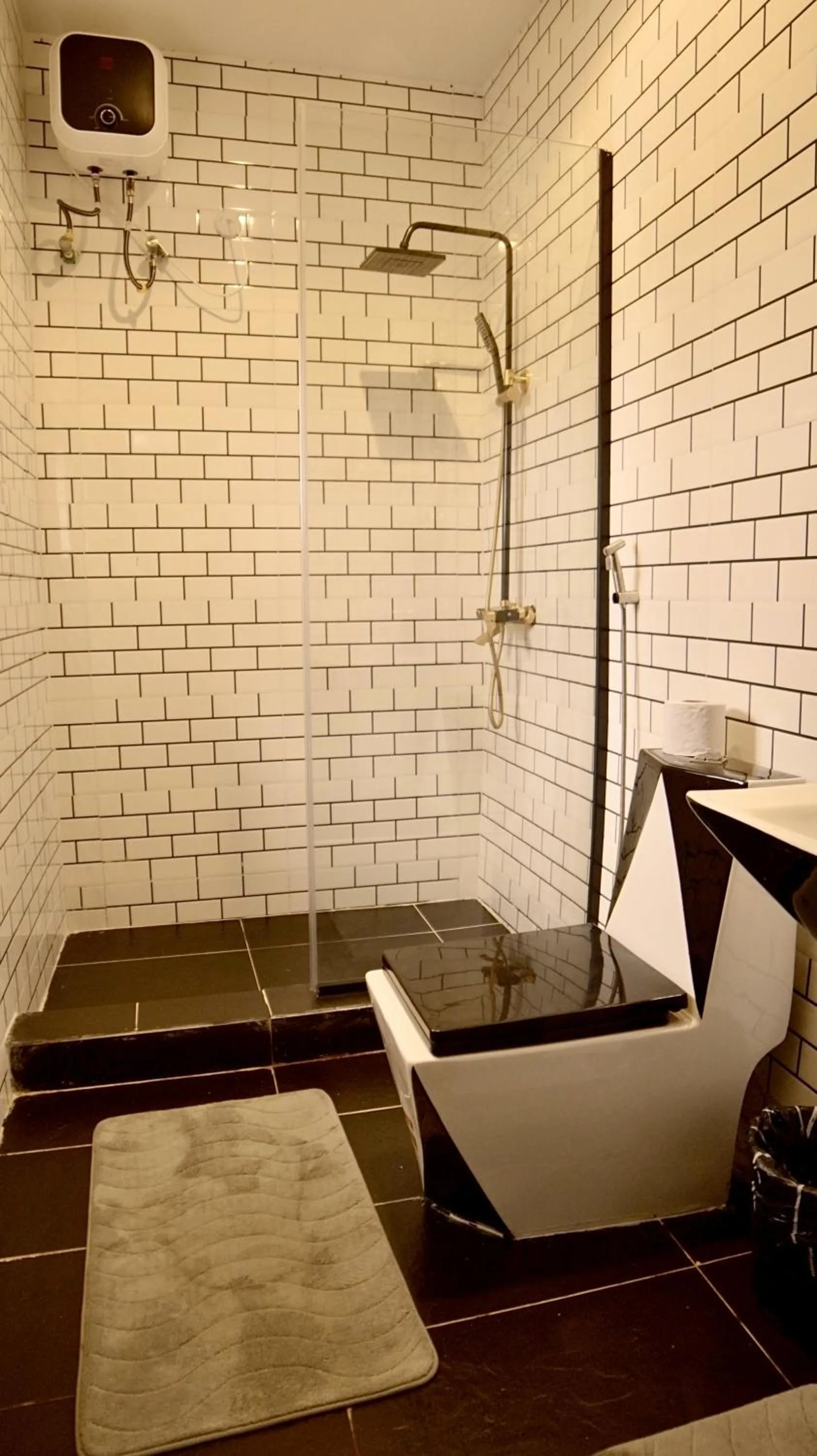 Shower in 247 Luxury Hotel & Apartment Ajah