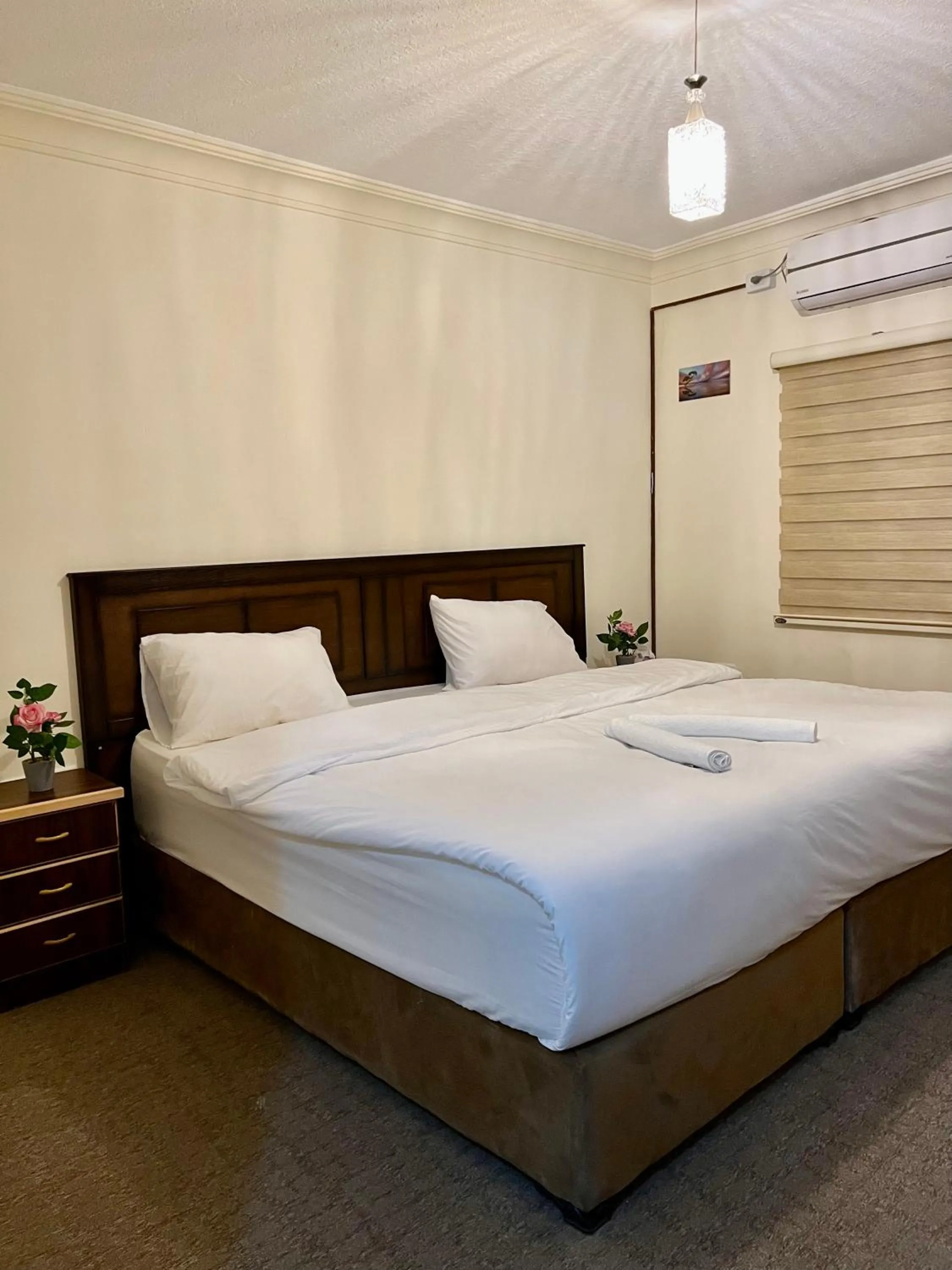 Bed in Raqeem Hotel