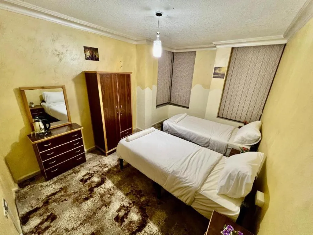 Bed in Raqeem Hotel