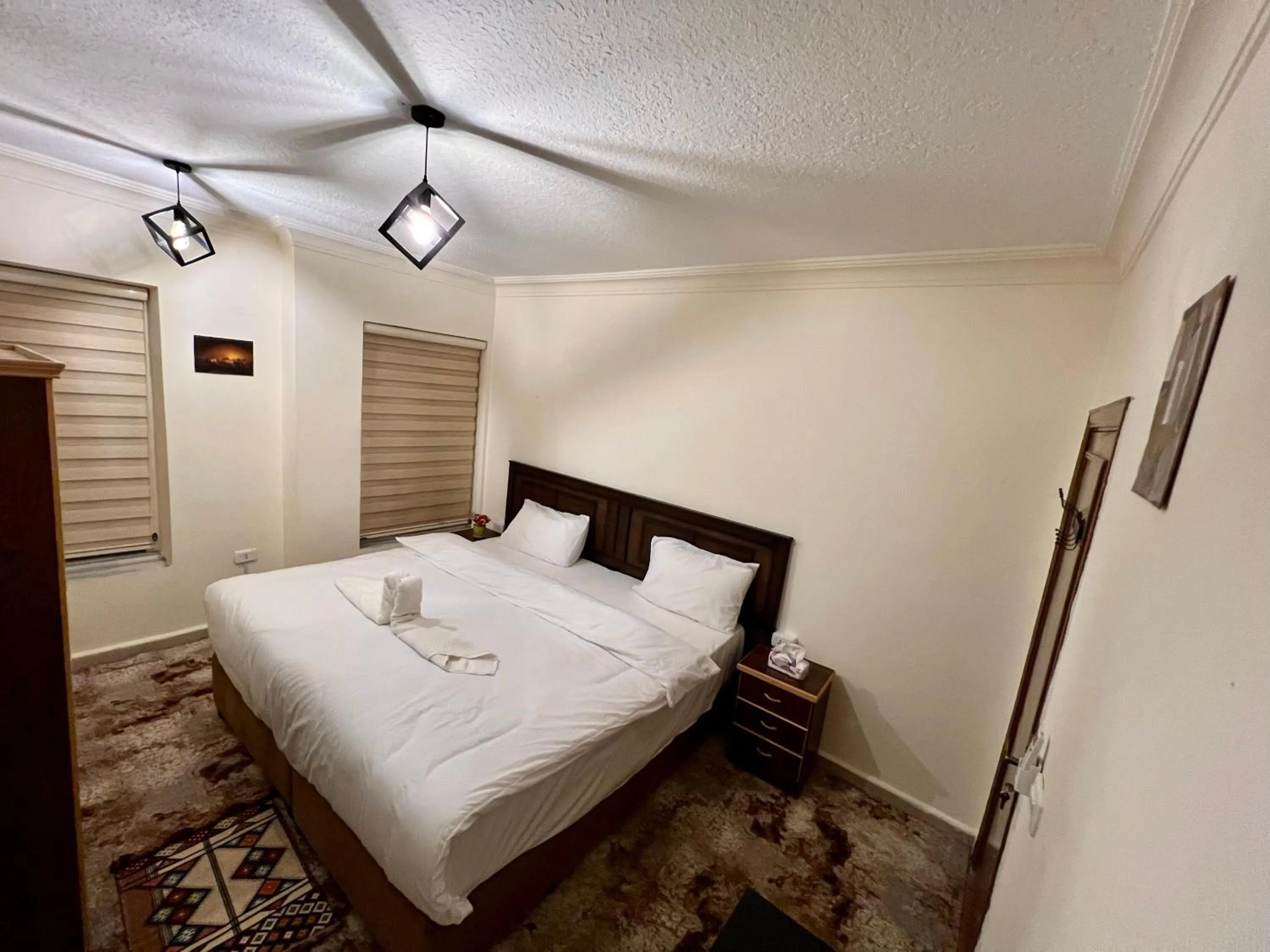 Bed in Raqeem Hotel