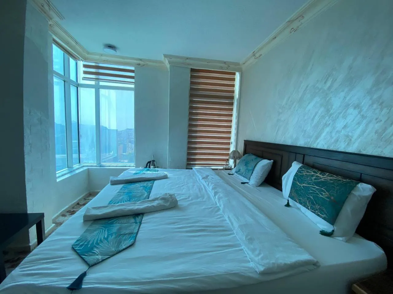 Bed in Raqeem Hotel