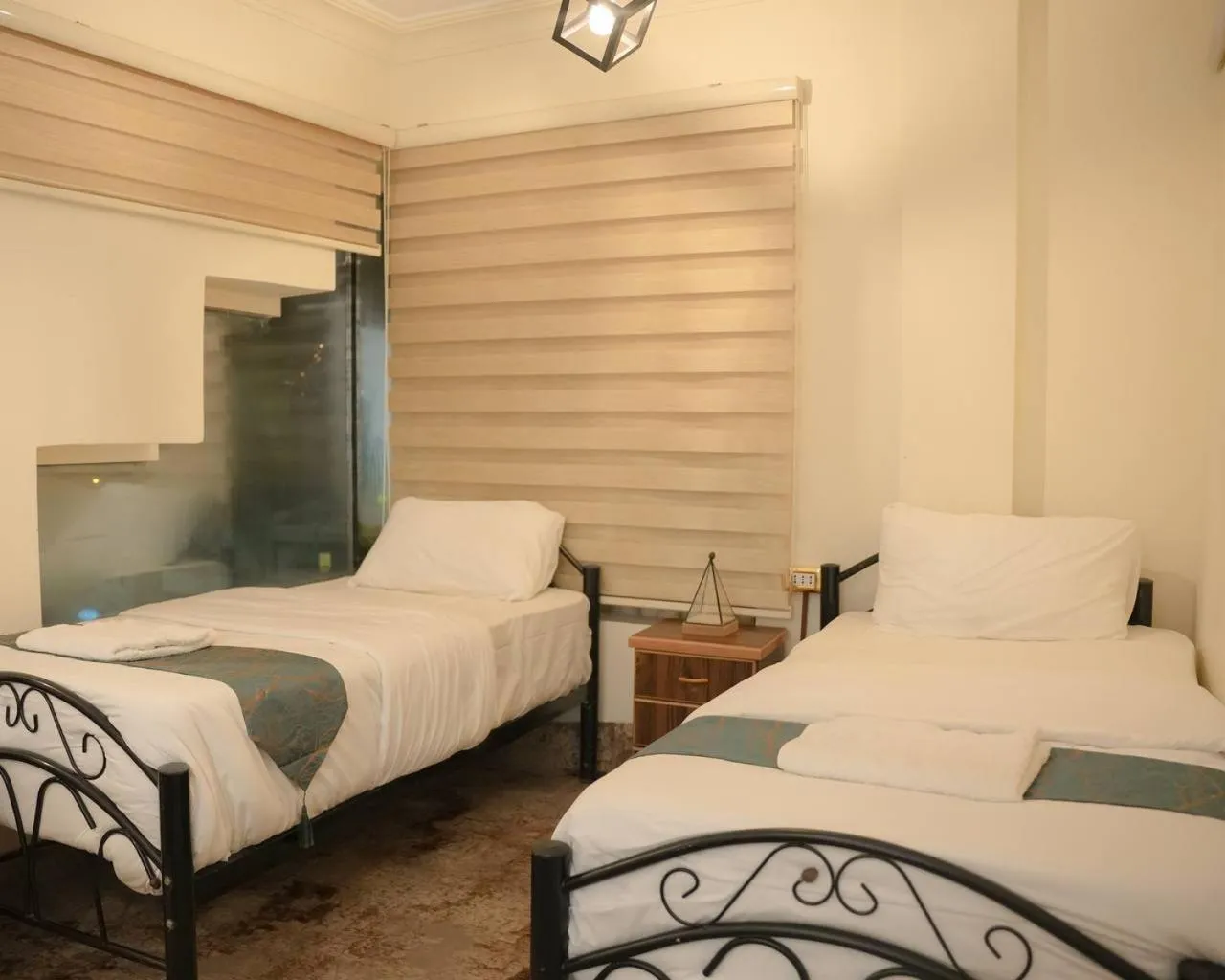 Bed in Raqeem Hotel