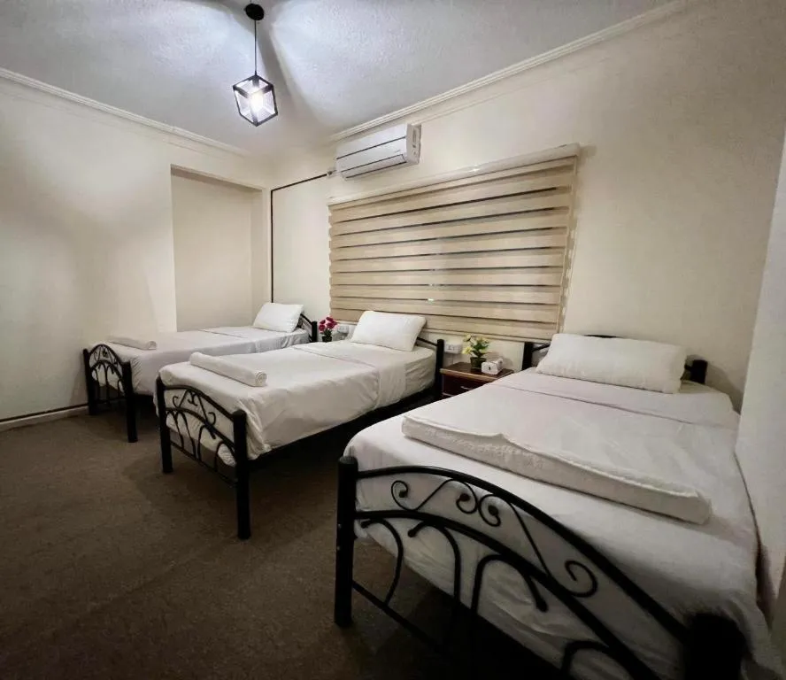 Bed in Raqeem Hotel