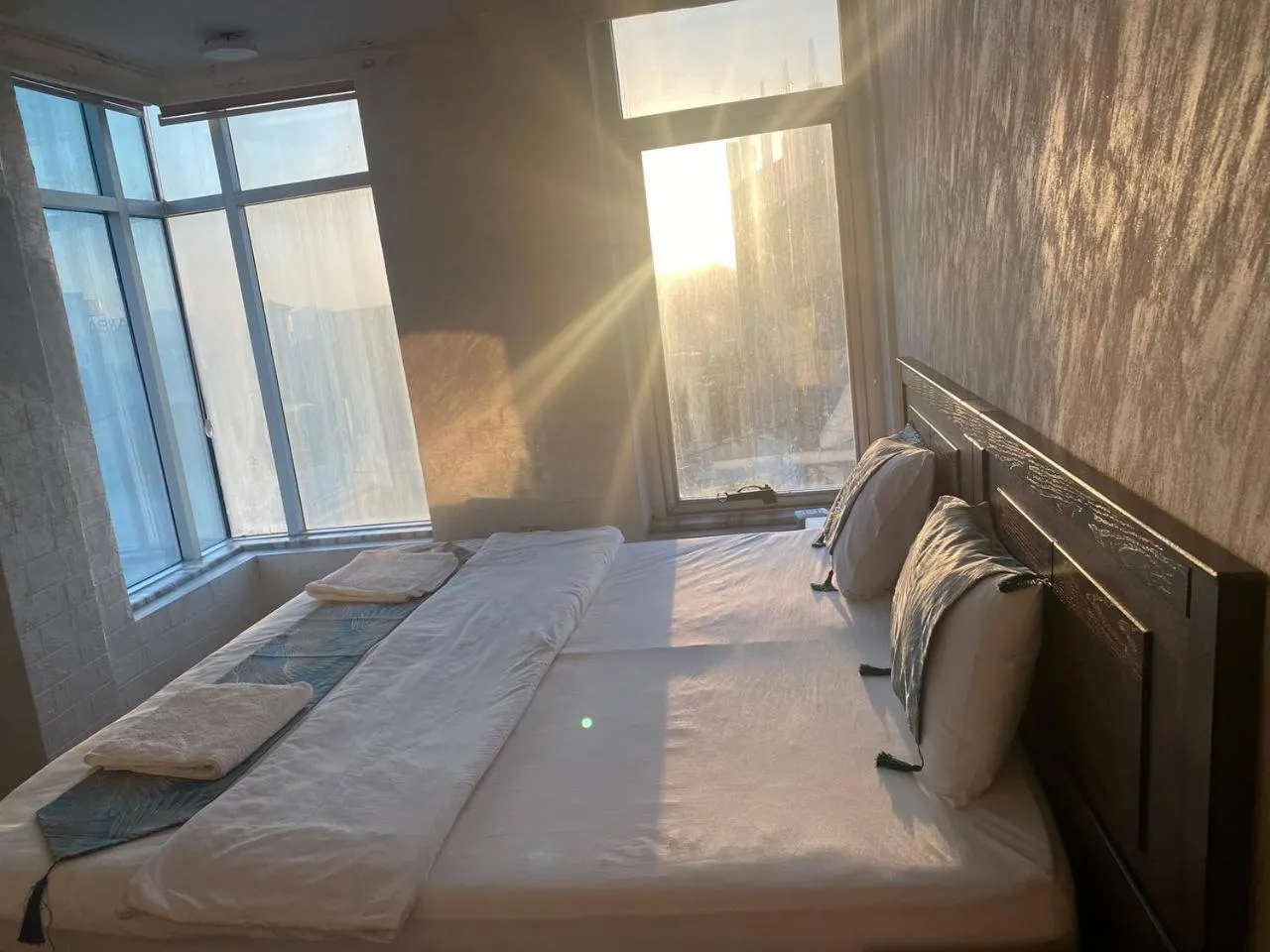 Bed in Raqeem Hotel