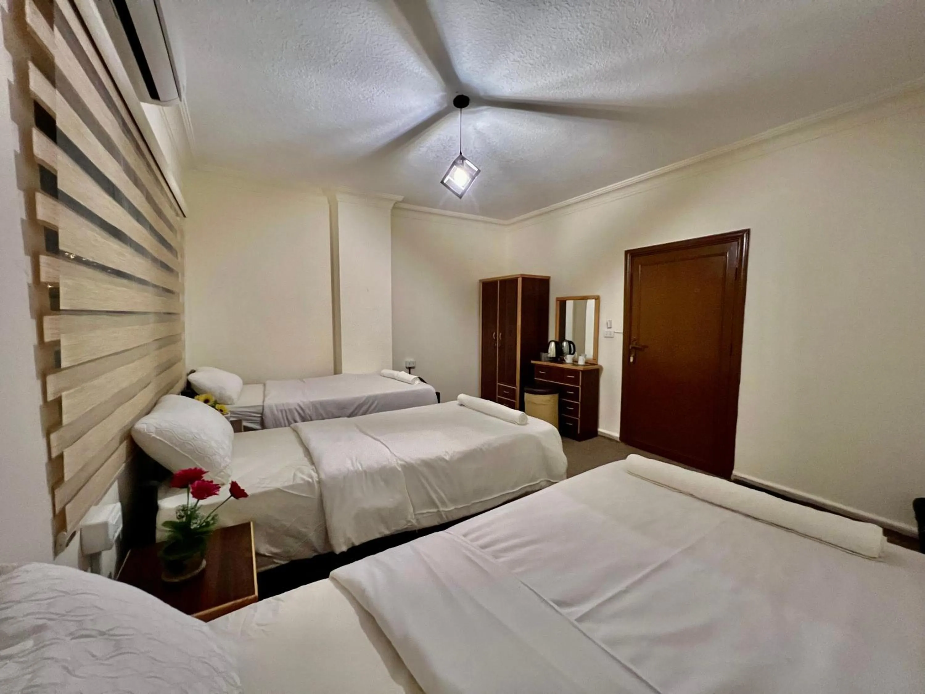 Bed in Raqeem Hotel