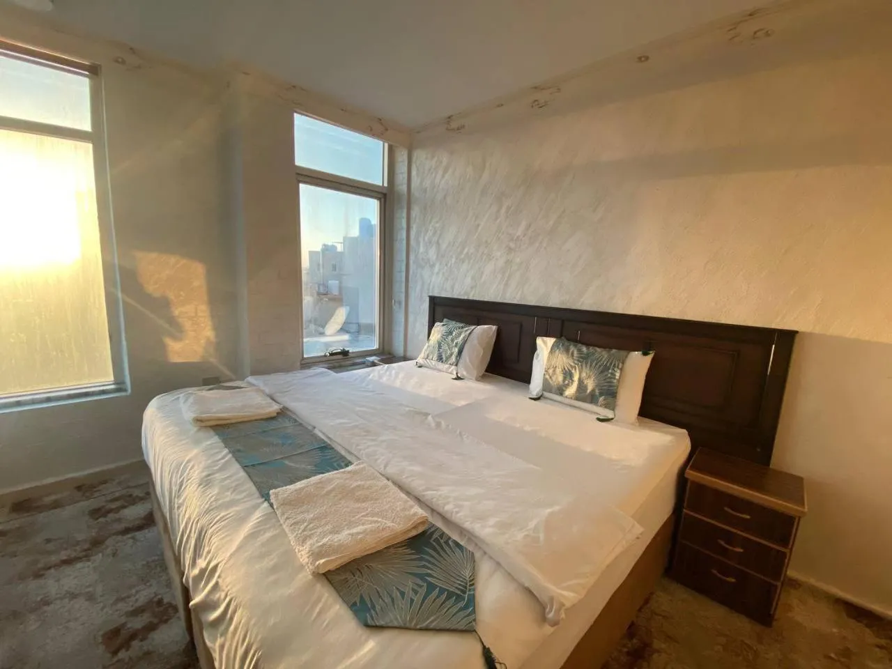 Bed in Raqeem Hotel