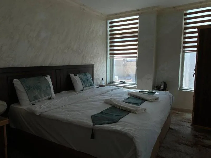 Bed in Raqeem Hotel