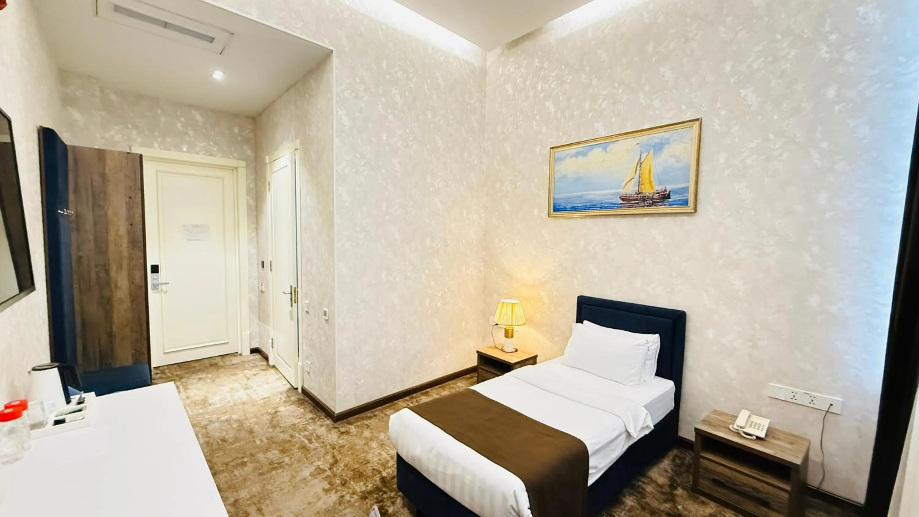 Bed in Garnet Hotel Tashkent