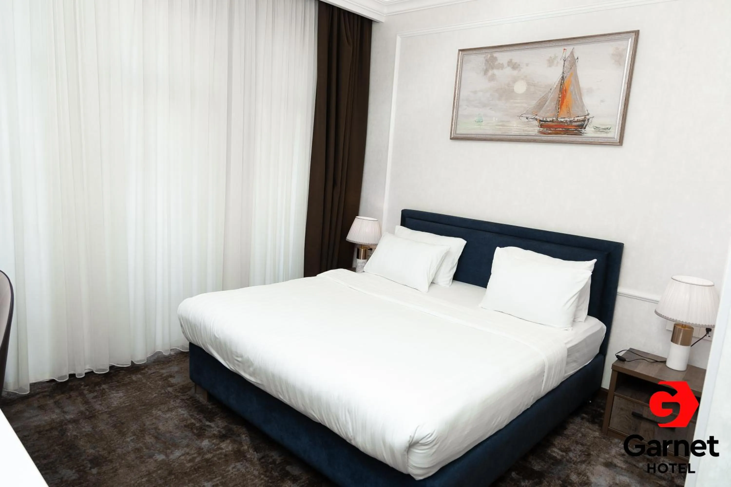 Bed in Garnet Hotel Tashkent