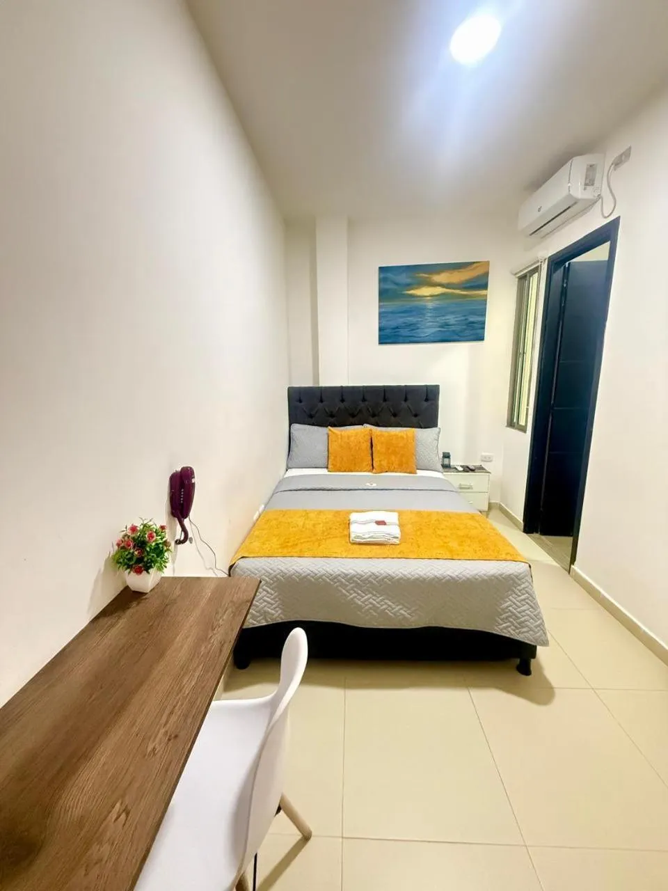 Bed in ANAJIRAWAA HOTEL