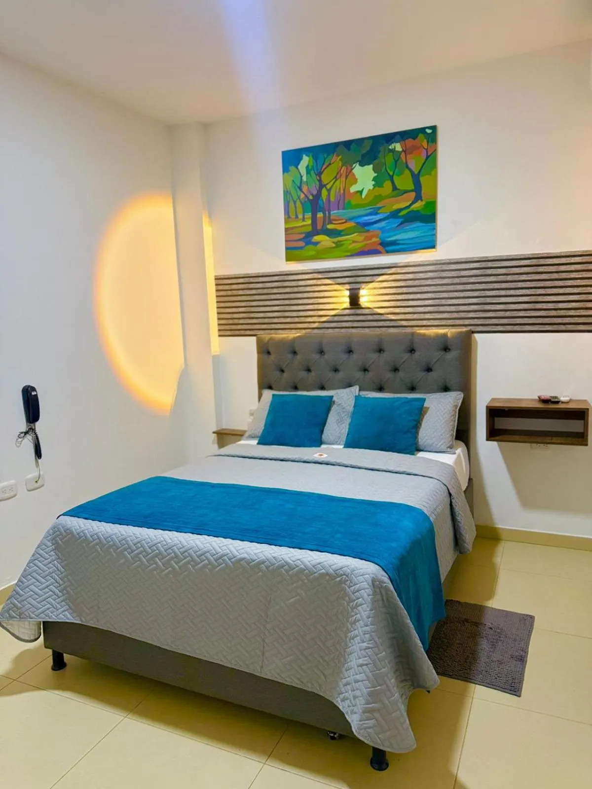 Bed in ANAJIRAWAA HOTEL