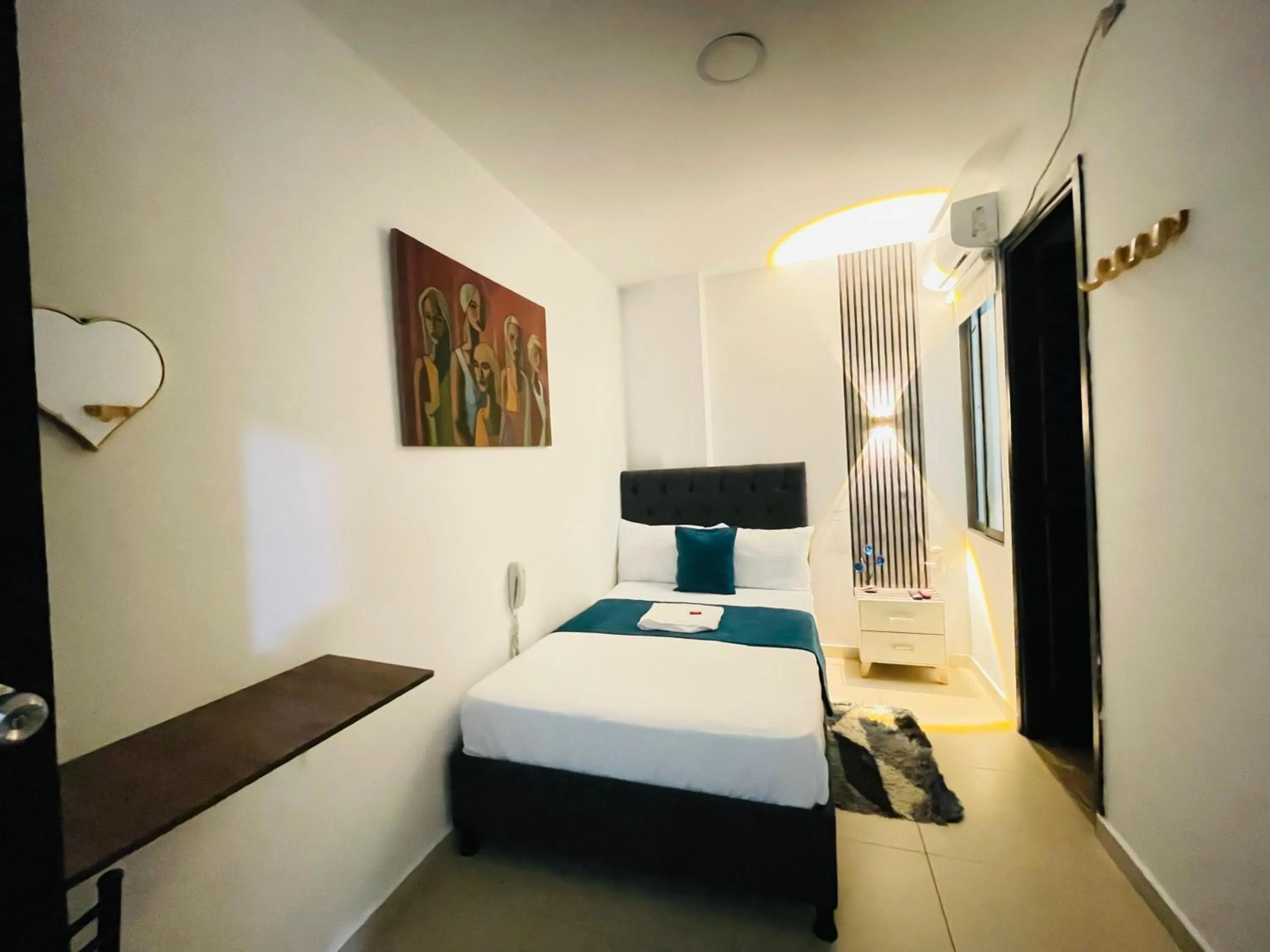 Bed in ANAJIRAWAA HOTEL