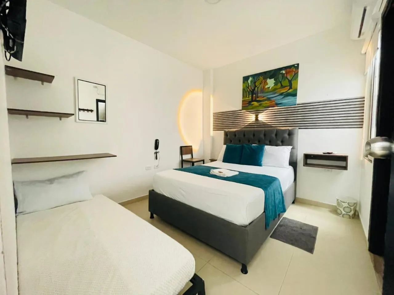 Bed in ANAJIRAWAA HOTEL