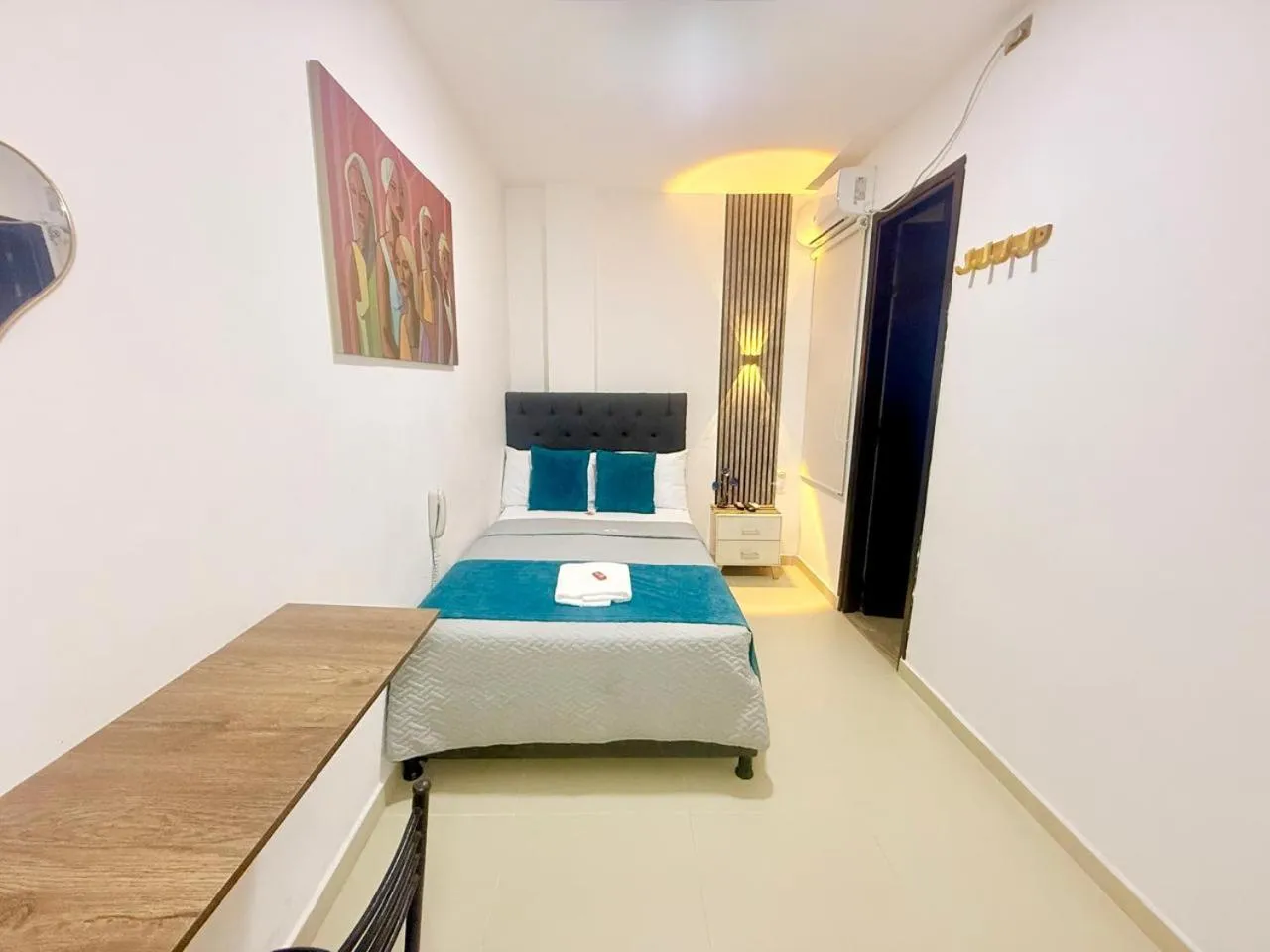 Bed in ANAJIRAWAA HOTEL