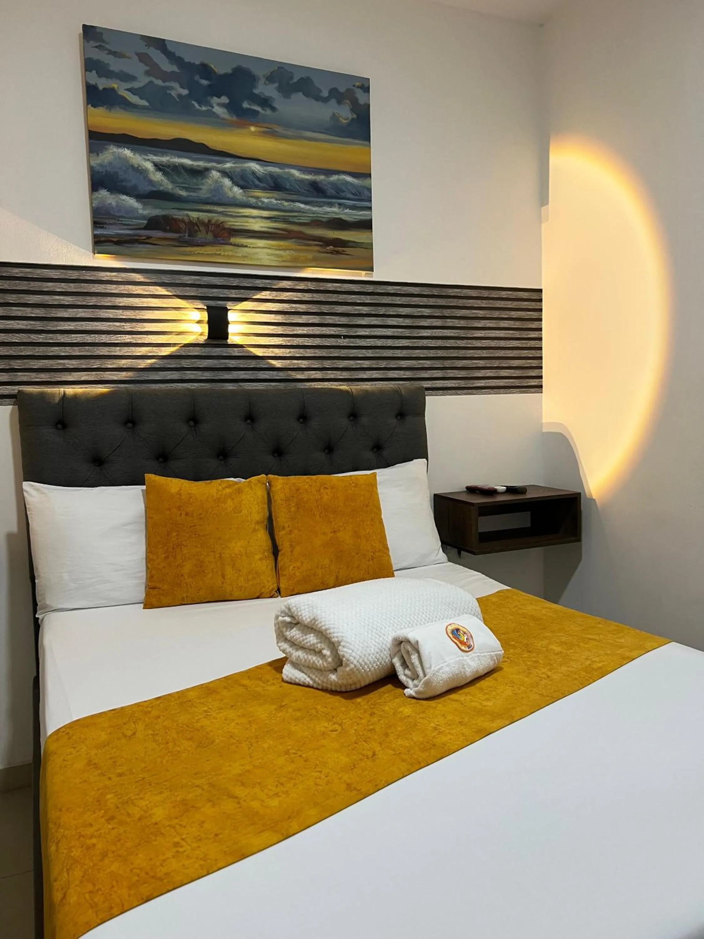 Bed in ANAJIRAWAA HOTEL