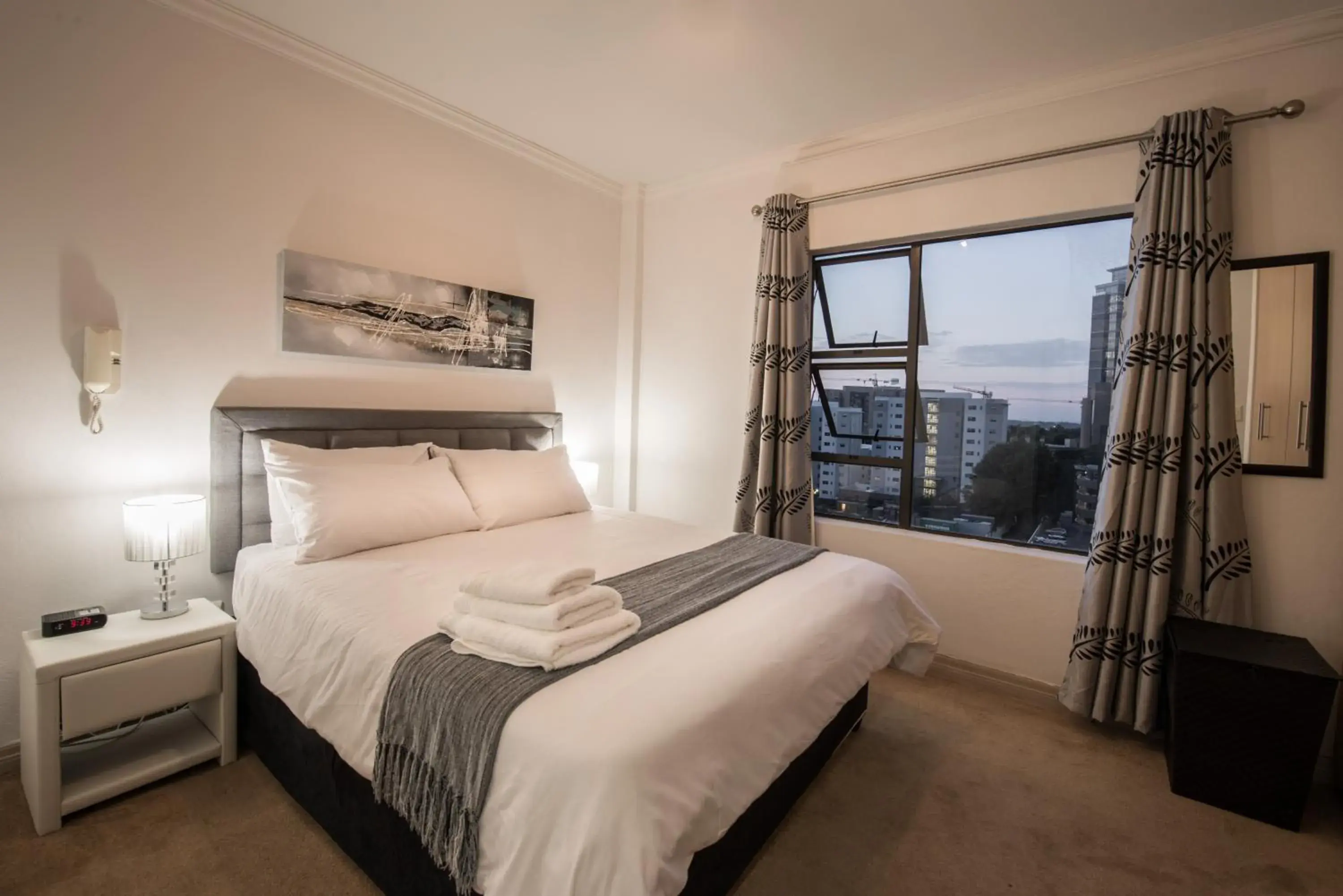 Photo of the whole room, Bed in Prestige Apartments Sandton at Westpoint Photo of the whole room, Bed in Prestige Apartments Sandton at Westpoint