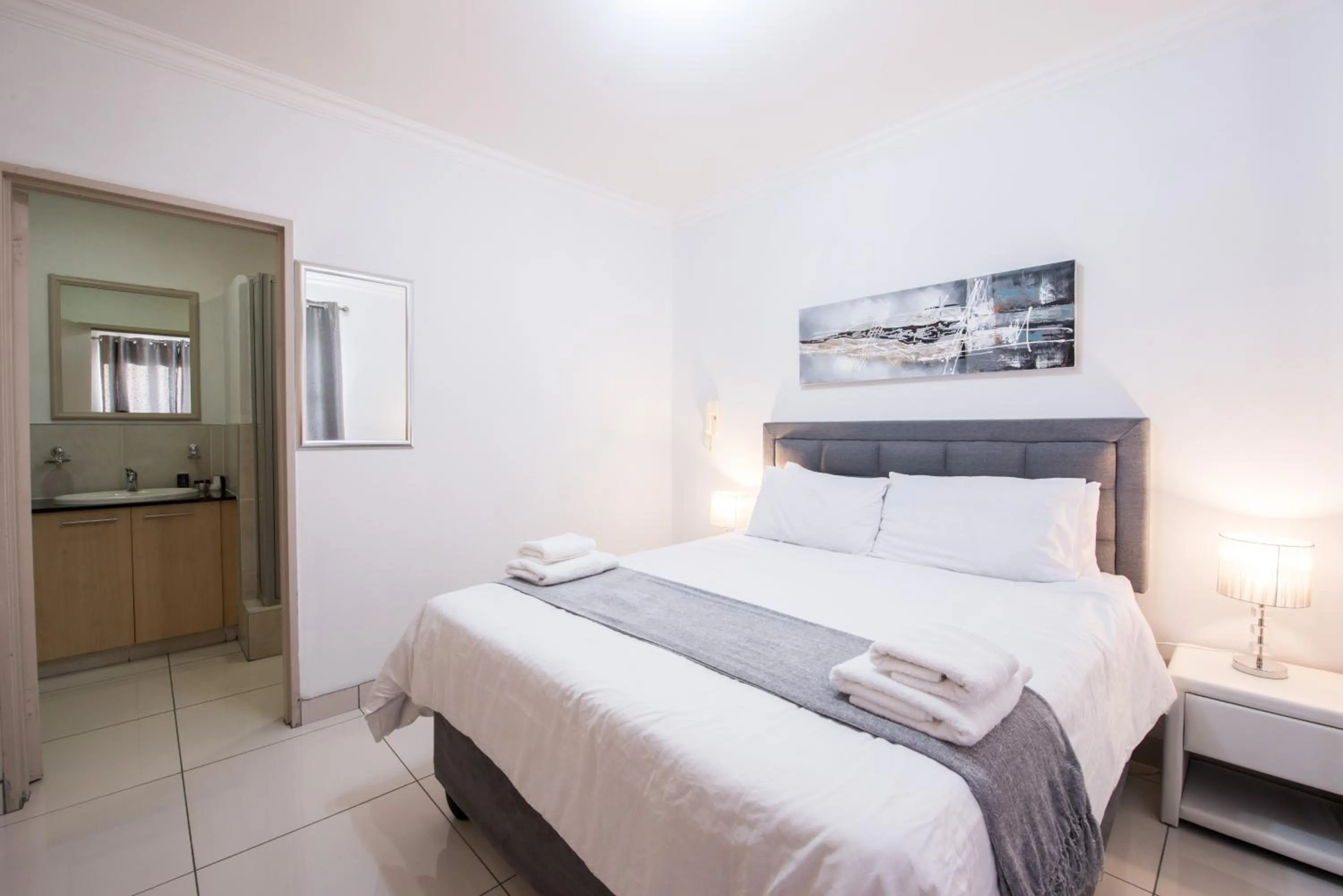 Bedroom, Bed in Prestige Apartments Sandton at Westpoint