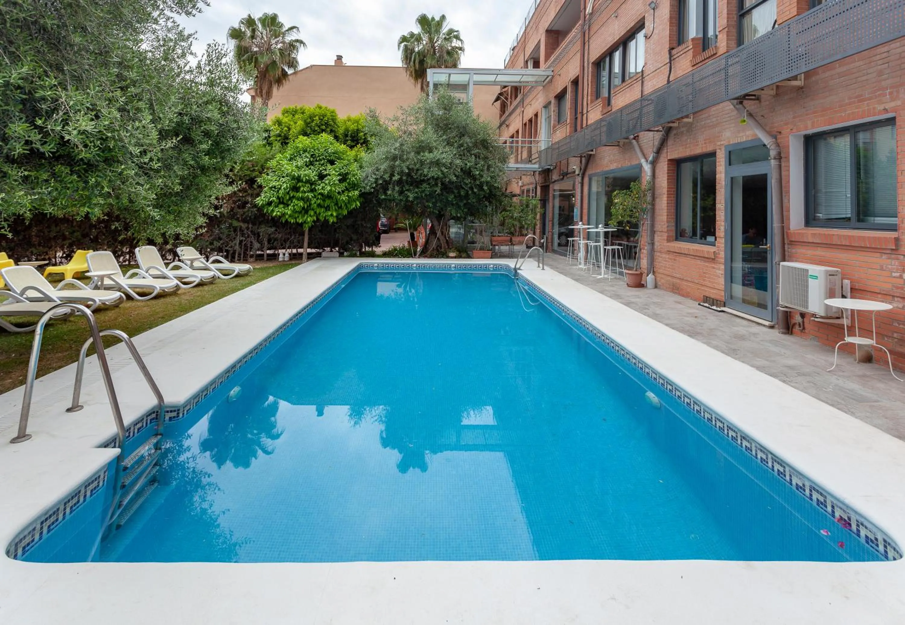 Swimming pool in AACR Hotel Monteolivos