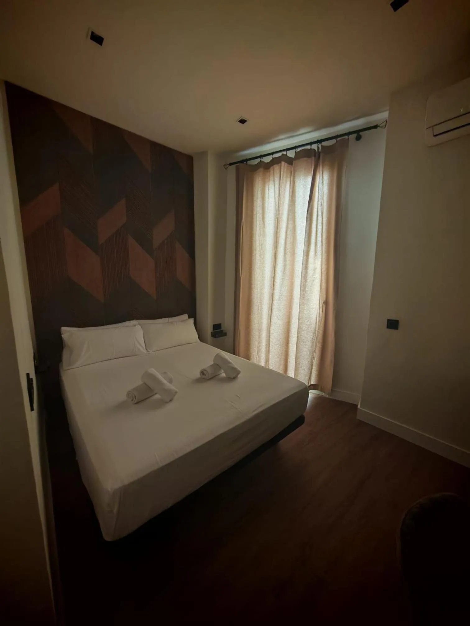 Bed in La Banda Suites