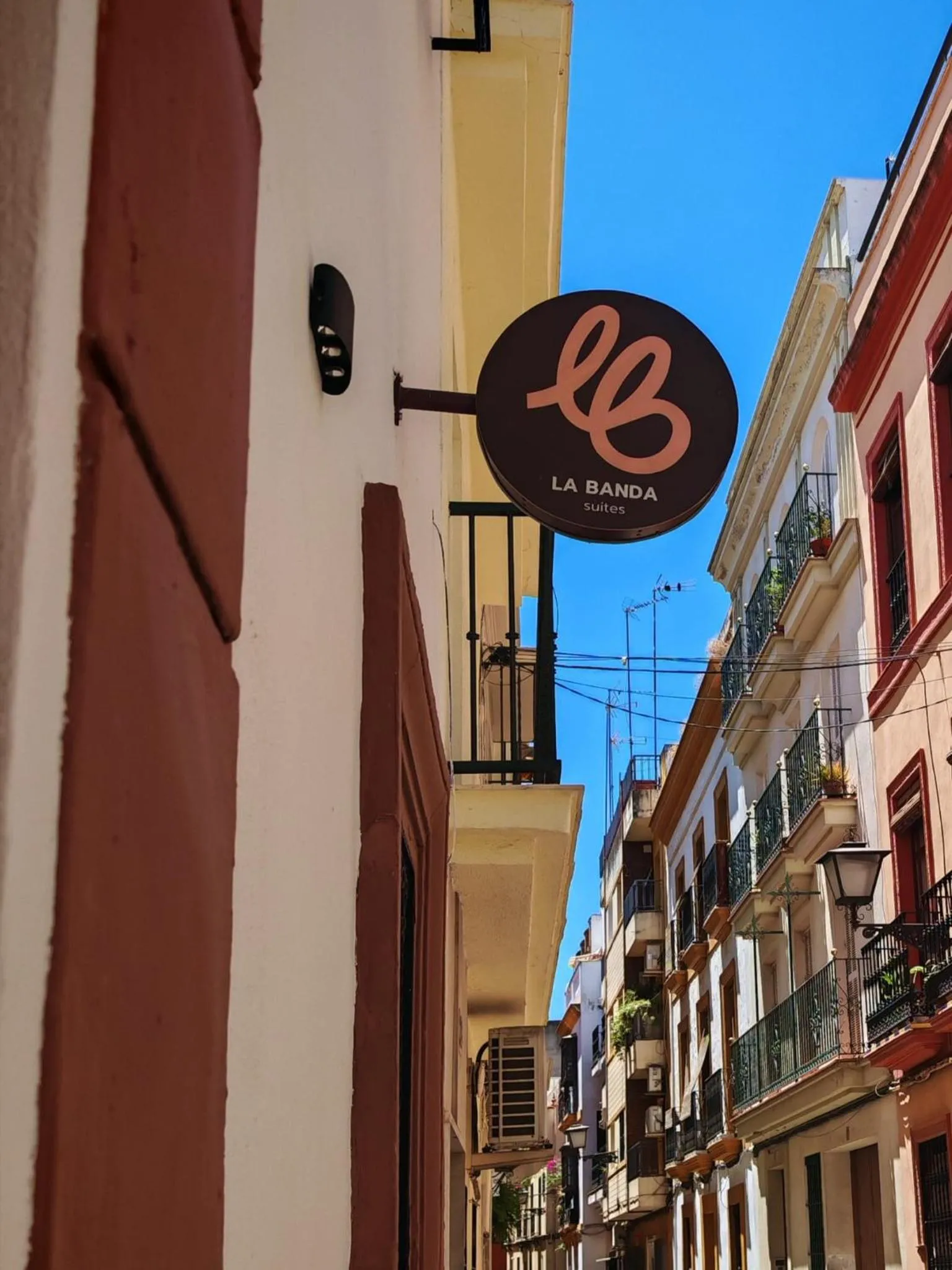 Property logo or sign in La Banda Suites