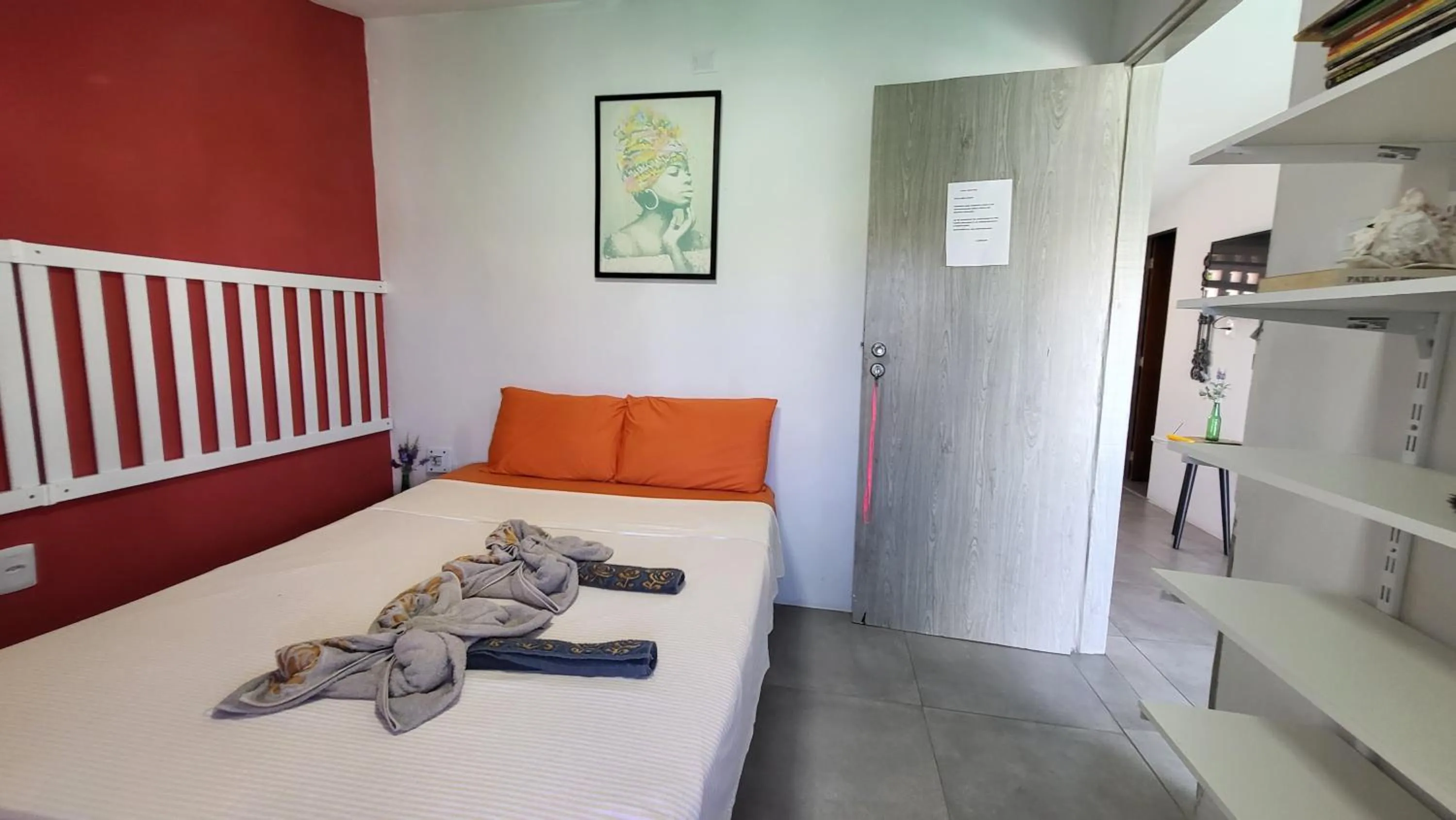 Bed in Tamboleiro's Hotel Residence