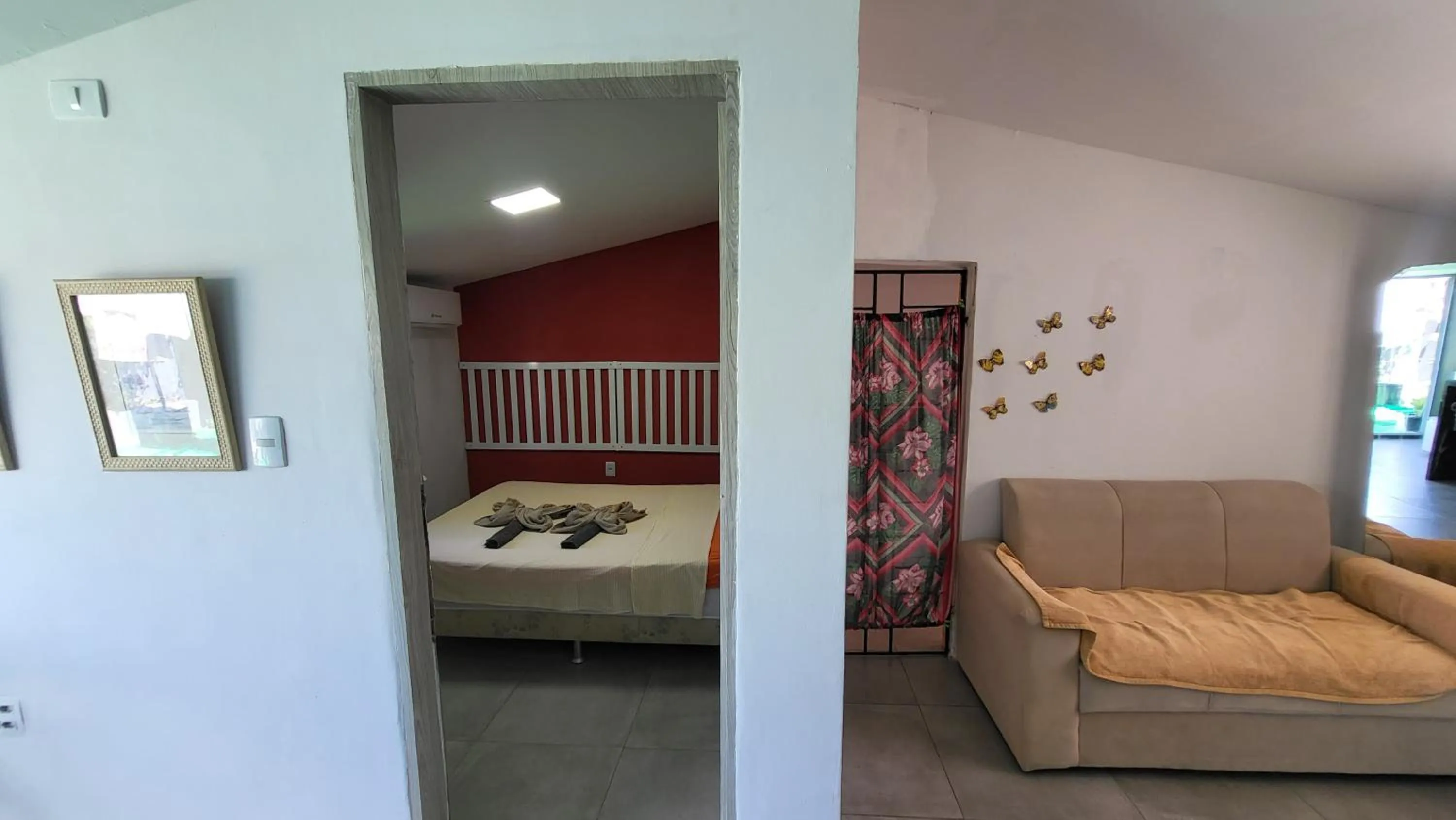 Bed in Tamboleiro's Hotel Residence