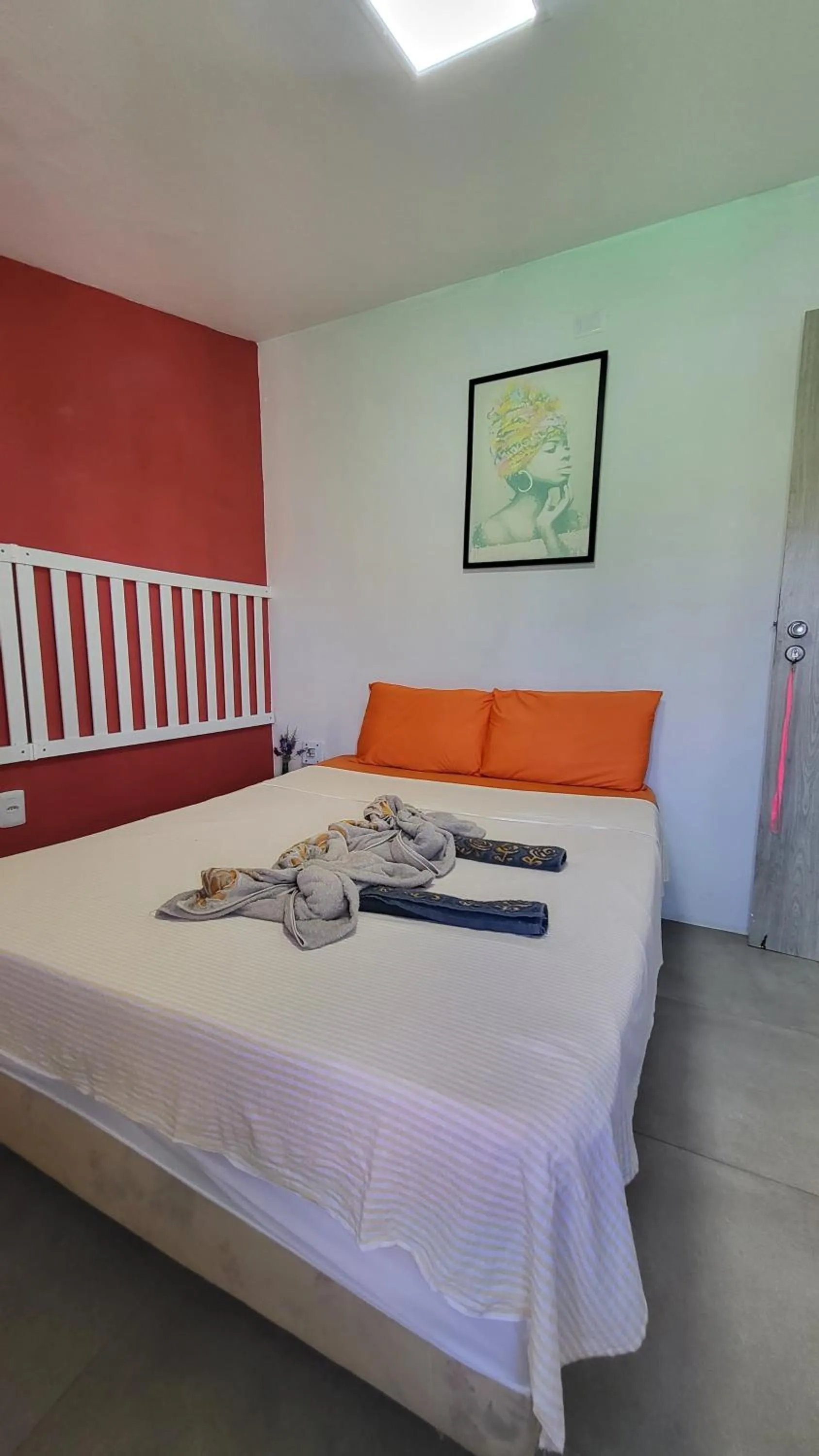 Bed in Tamboleiro's Hotel Residence