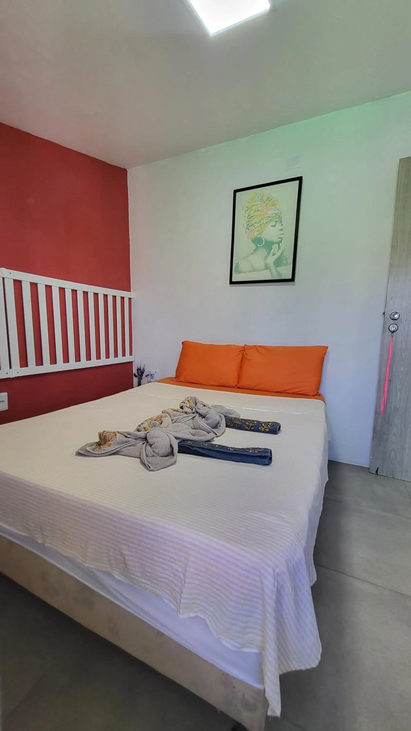 Bed in Tamboleiro's Hotel Residence