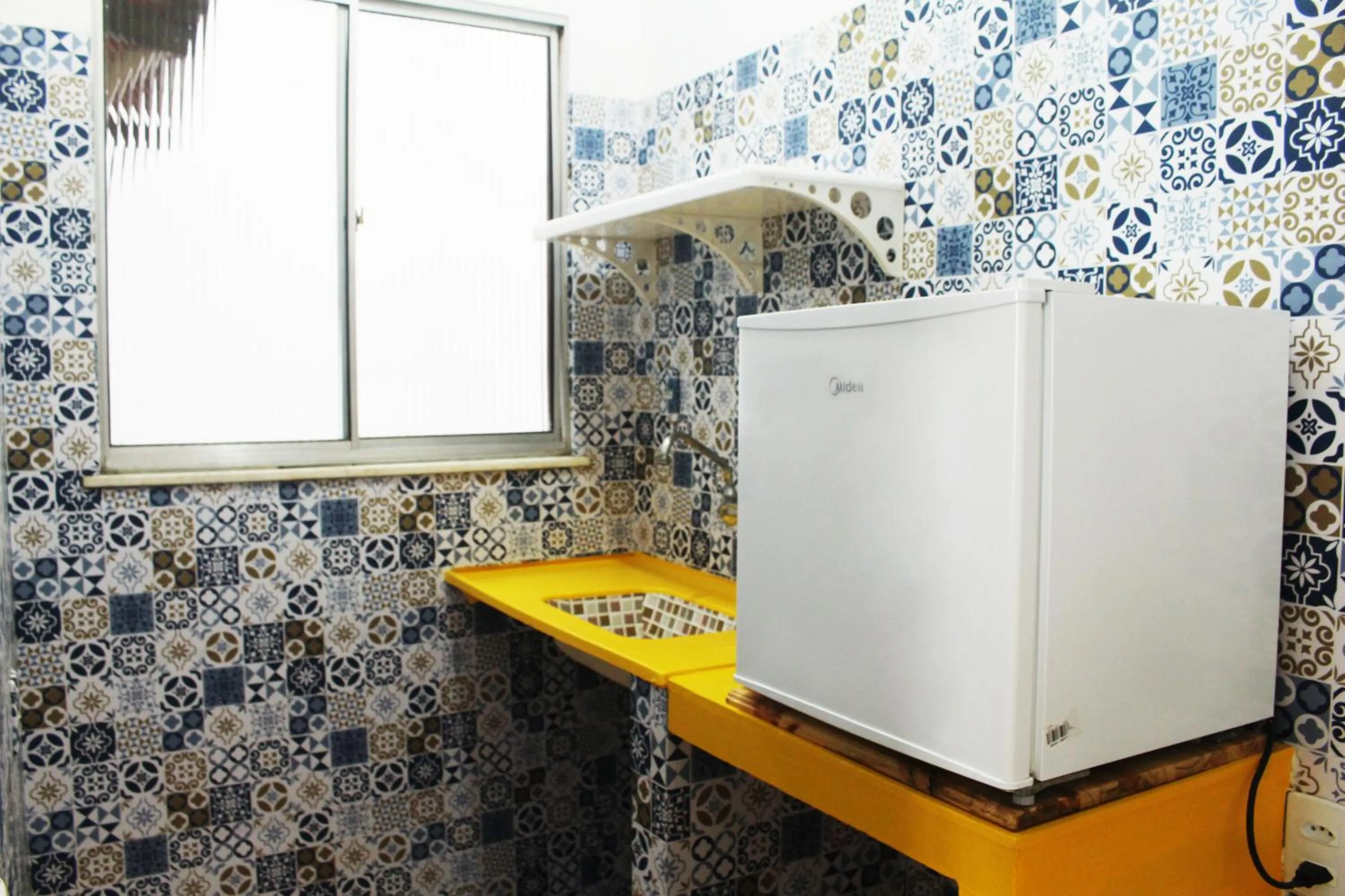 Kitchen or kitchenette in Tamboleiro's Hotel Residence